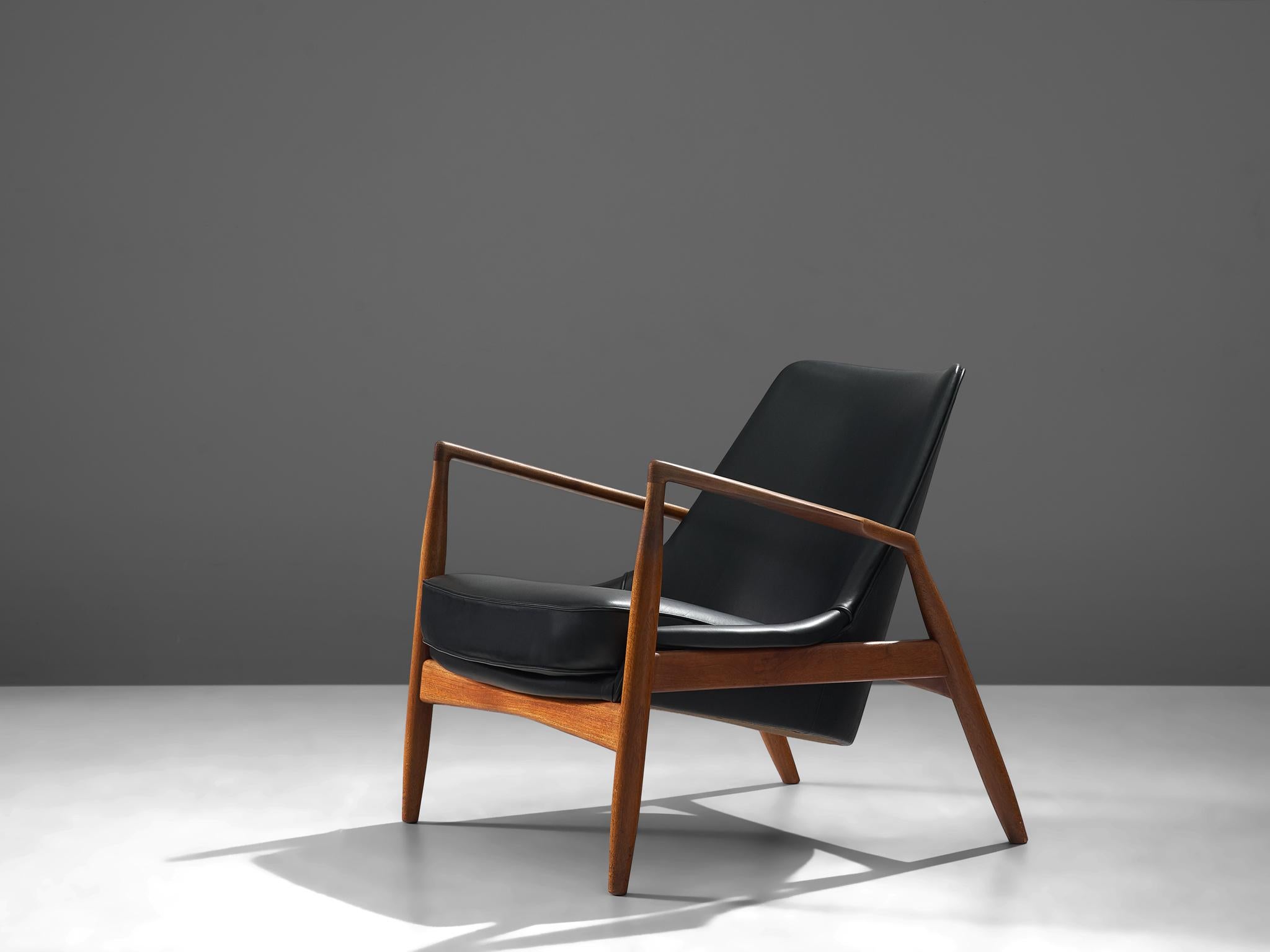 Ib Kofod-Larsen for OPE, 'Sälen' (Seal) lounge chair model 503-799, teak and leather, Sweden, 1956. 

Iconic seal lounge chair, by Ik Kofod-Larsen. The well-crafted frame of this chair is made of a light colored teak. It shows very nice details and