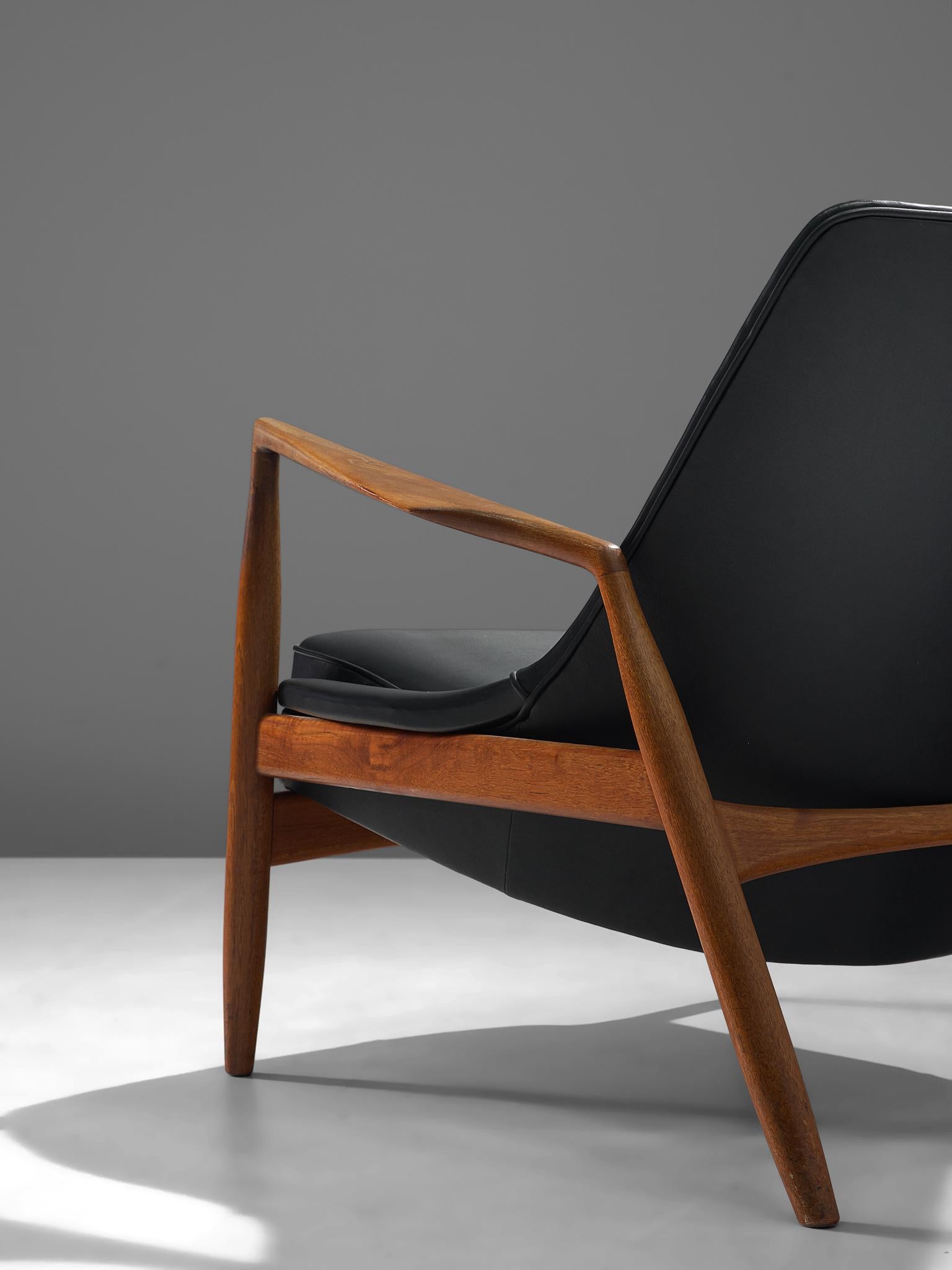 Danish Ib Kofod-Larsen Black Leather Seal Chair in Teak