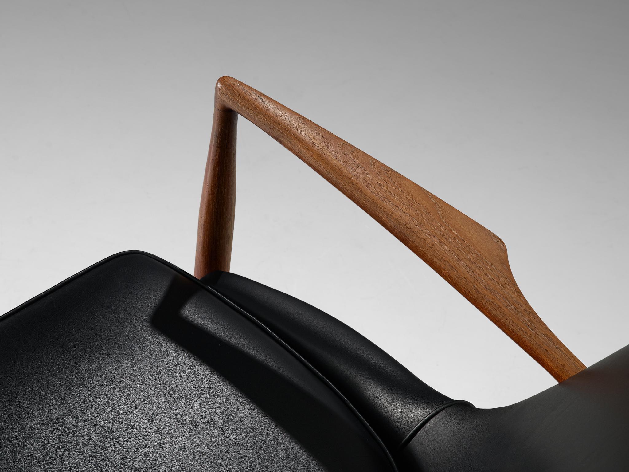 Mid-20th Century Ib Kofod-Larsen Black Leather Seal Chair in Teak