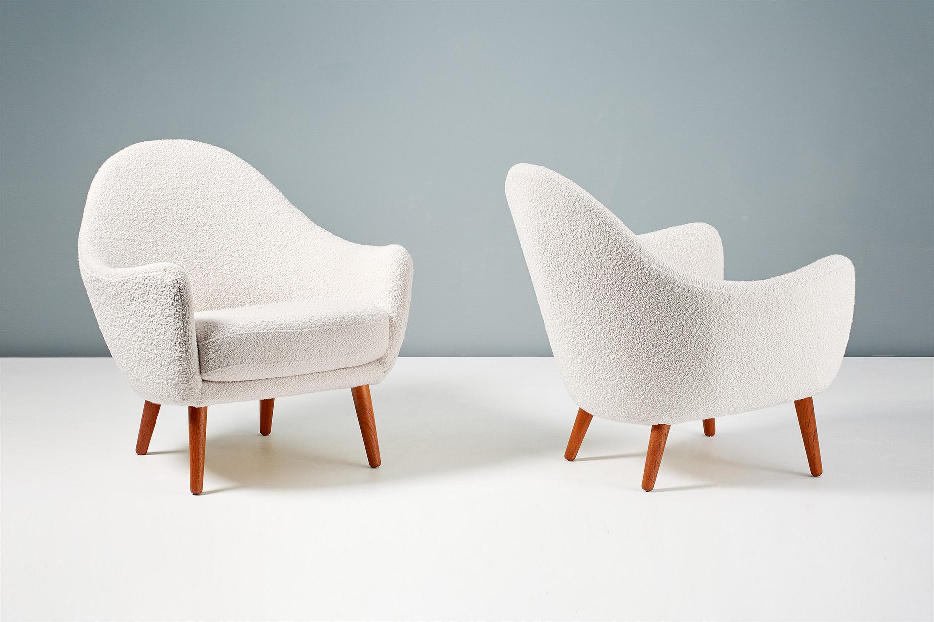 Ib Kofod-Larsen 
Lounge chairs, 1960s

Lounge chairs attributed to Ib Kofod-Larsen, circa 1960s, Denmark. Turned teak legs with seats and sprung cushions reupholstered in luxurious Dedar bouclé wool fabric.