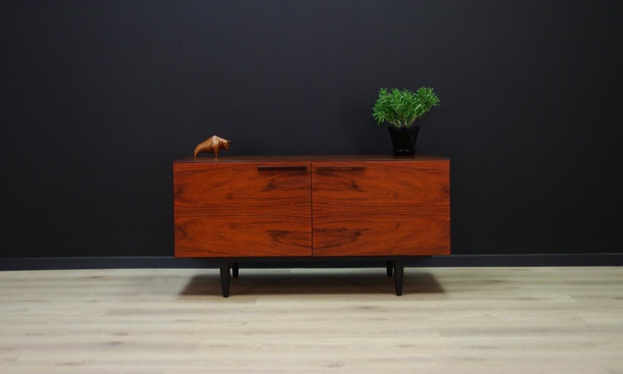 Unique chest of drawers from the 1960s - a minimalist form designed by IB Kofoda-Larsen, directly from the Faarup møbelfabrik manufactory, Danish design at its best. Finished with rosewood veneer. Spacious interior with a shelf behind the doors.