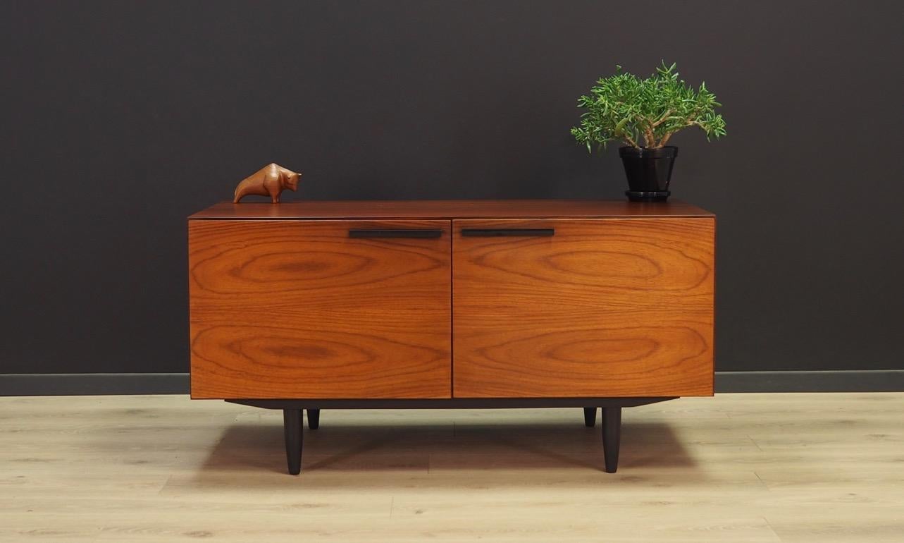 Phenomenal cabinet from the 1960s-1970s. Ib Kofod-Larsen's project is a flagship representative of Scandinavian design. Minimalistic form, attention to detail and perfection of workmanship. Manufactured by FAARUP Mobelfabrik. Surface of the