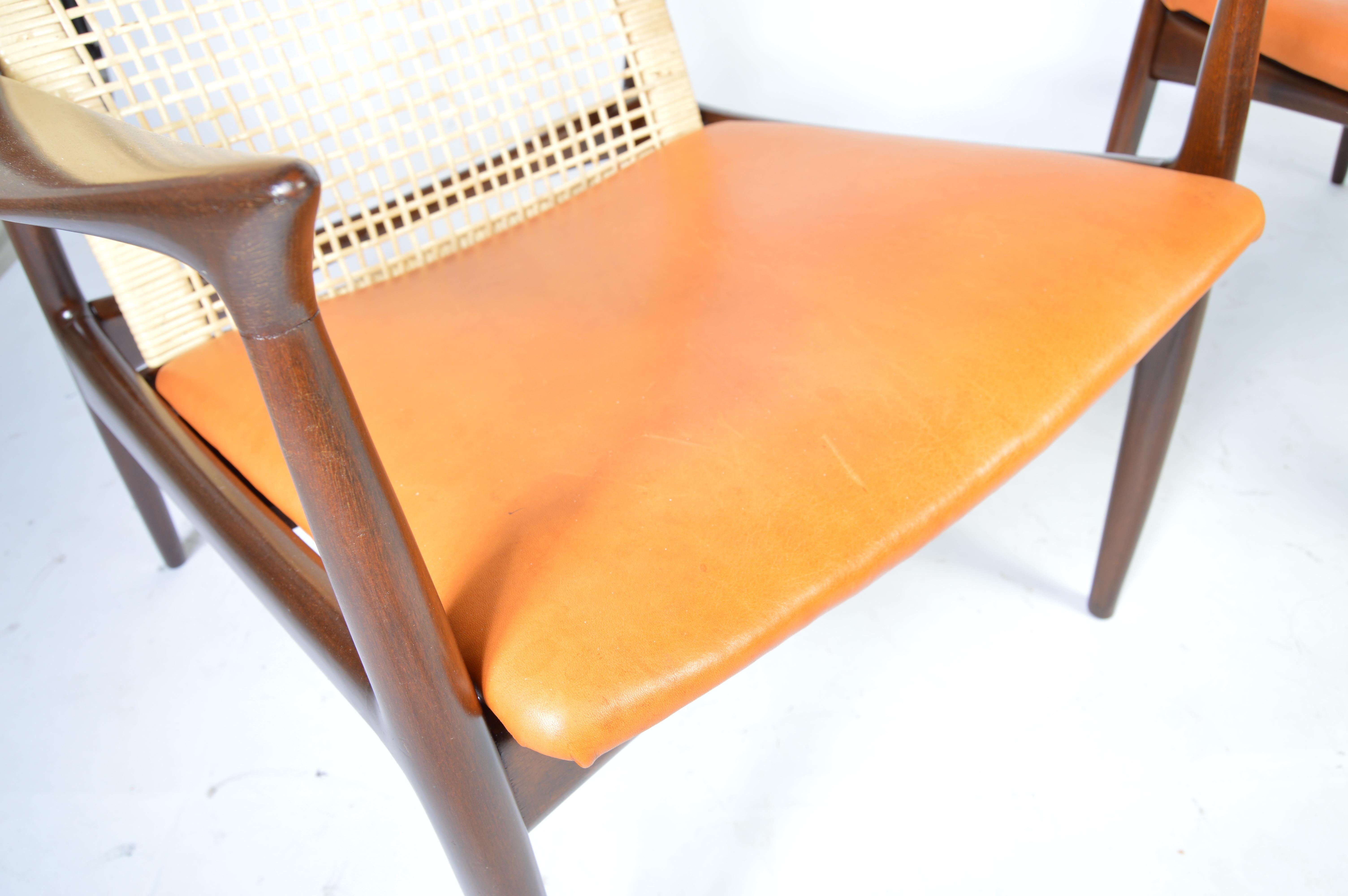 Danish IB Kofod Larsen Cane Back Easy Chairs in Vegetable Dyed Leather