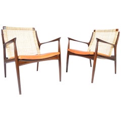 IB Kofod Larsen Cane Back Easy Chairs in Vegetable Dyed Leather