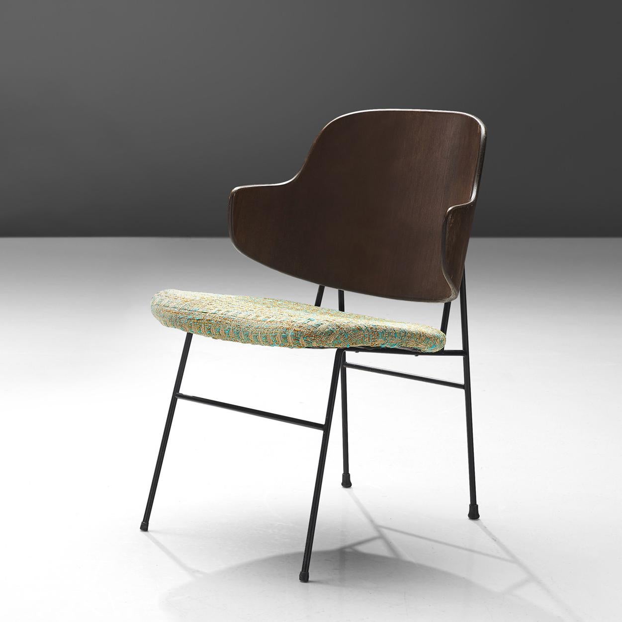 Ib Kofod-Larsen, 'Penguin' chair, walnut, steel, metal, Denmark, design 1953, production, 1960s

This 'Penguin' chair was designed by Ib Kofod-Larsen. The chair was first taken into production by Selig in 1953. The chair is always built up of a