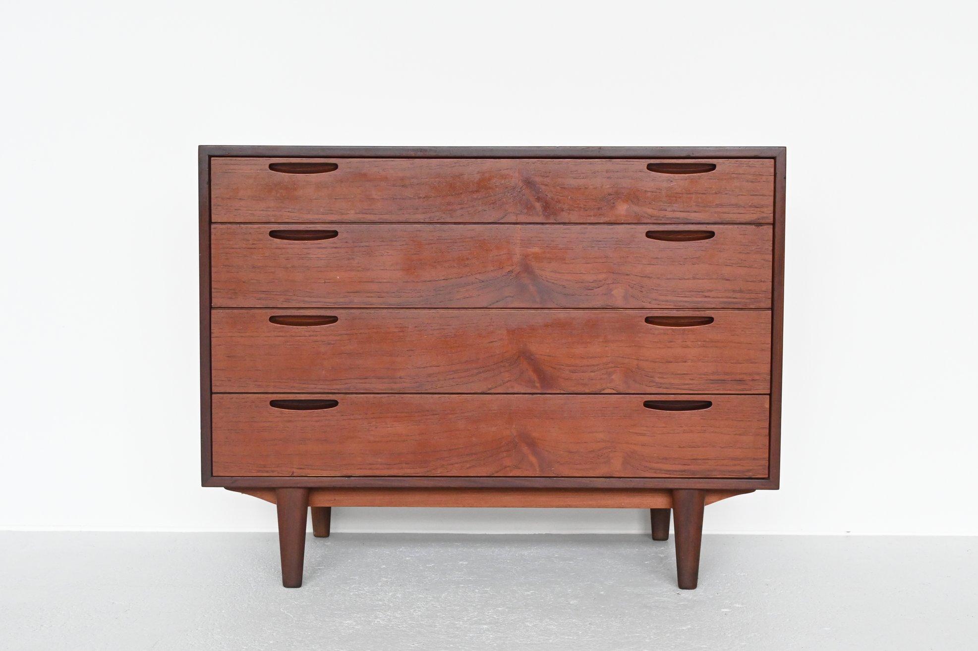 Very nice chest of drawers designed by Ib Kofod-Larsen and manufactured by J. Clausen Brande Møbelfabrik, Denmark, 1960. Typical high quality Scandinavian design, superb finished all around and even the teak wooden back. Nice details are the