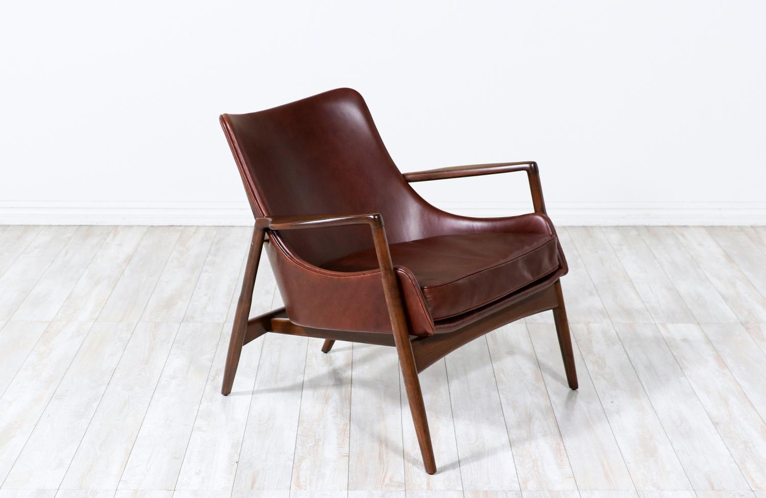 Ib Kofod-Larsen Cognac Leather Lounge Chair for Selig
________________________________________

Transforming a piece of Mid-Century Modern furniture is like bringing history back to life, and we take this journey with passion and precision. With