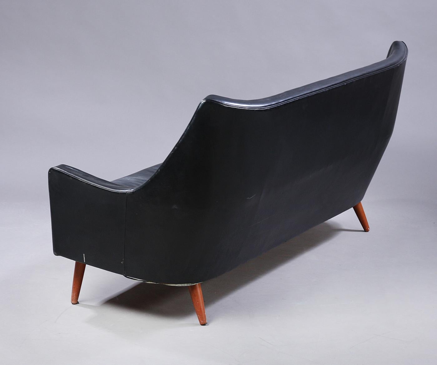 Danish Ib Kofod Larsen Curved Back Sofa Black Leather, 1954 For Sale