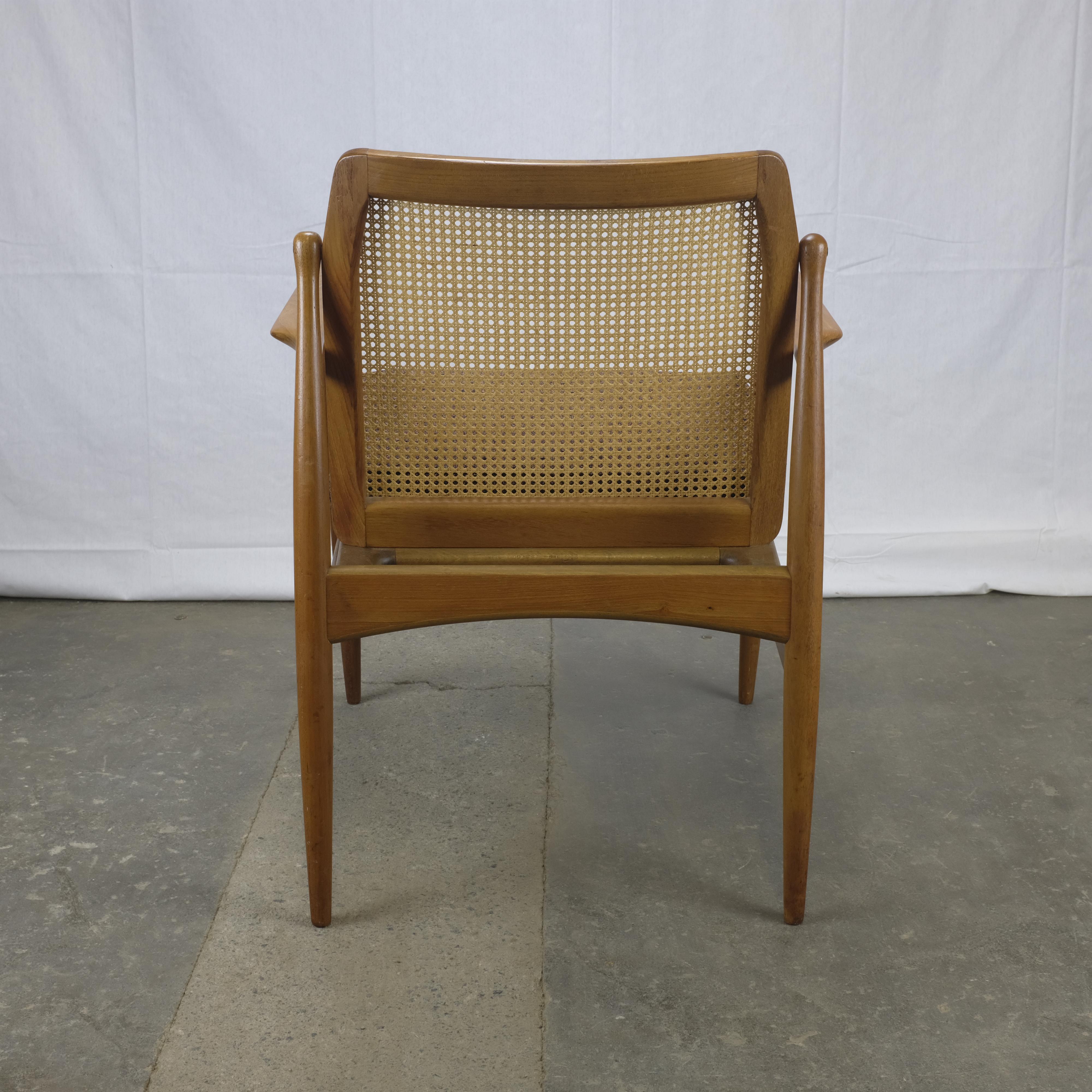 Mid-20th Century Ib Kofod-Larsen Danish Modern Teak Cane-Backed Armchair by Selig For Sale