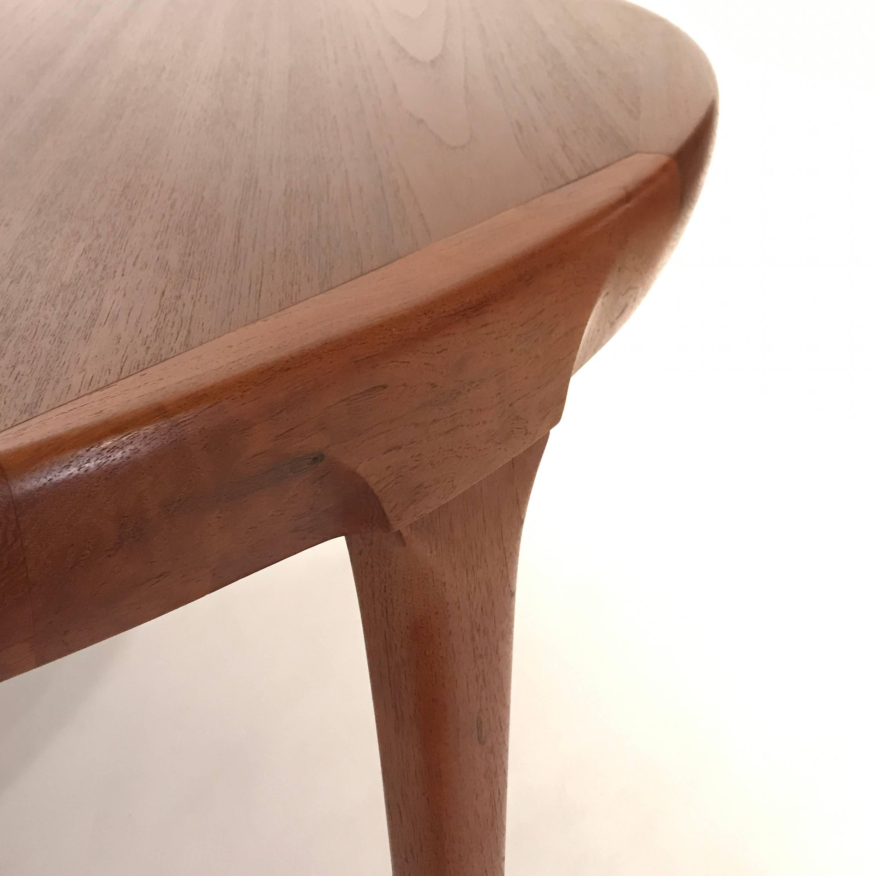 Gorgeous sculptural Danish modern dining table designed by Ib Kofod Larsen. Its a 54.5