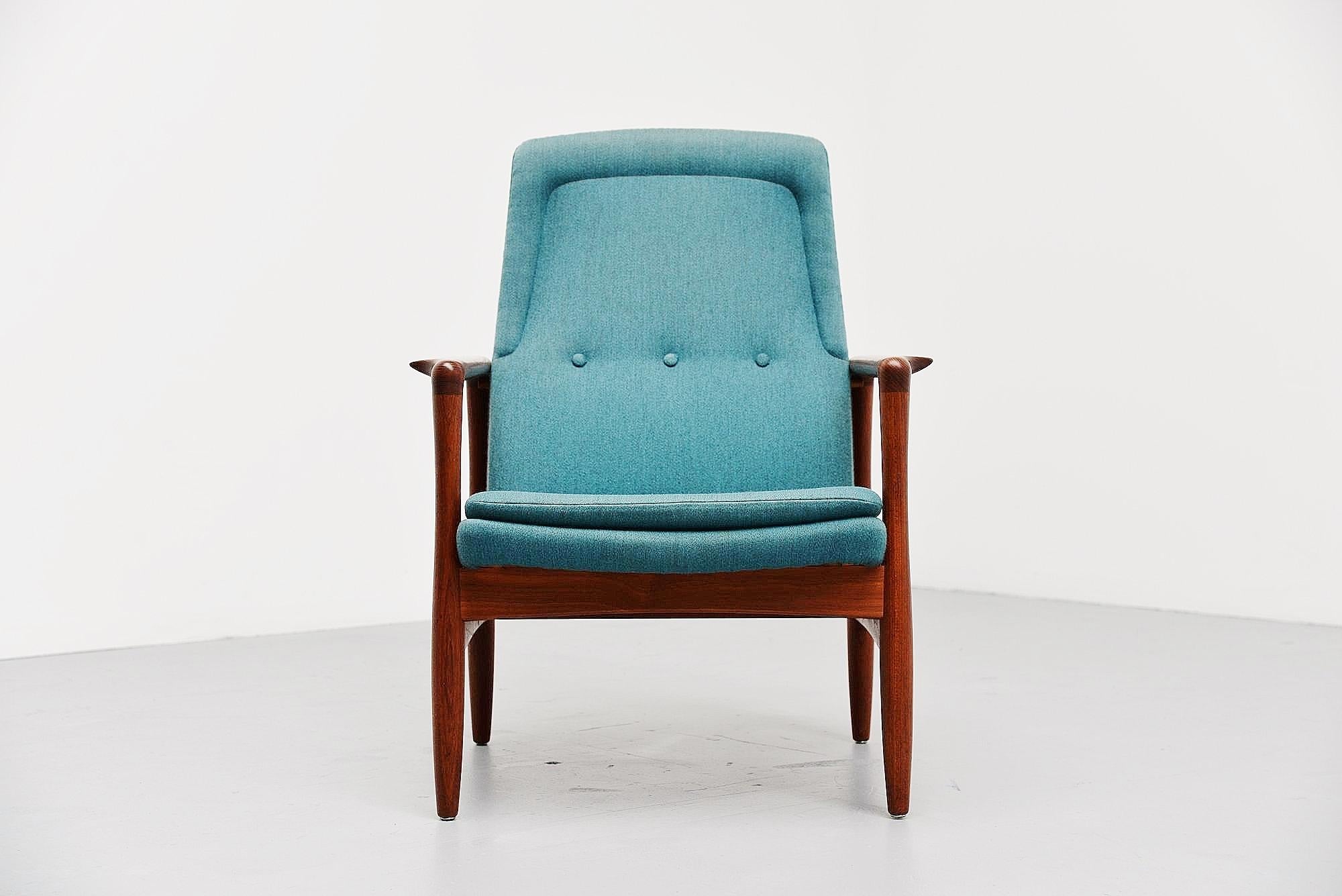 Rare easy chair designed by Torbjørn Afdal for vein Bjørneng / Bruksbo, Denmark 1957 - 1958. This chair has a solid teak wooden frame and original blue upholstery which was still in perfect condition. We just renewed the foam of the seating cushion