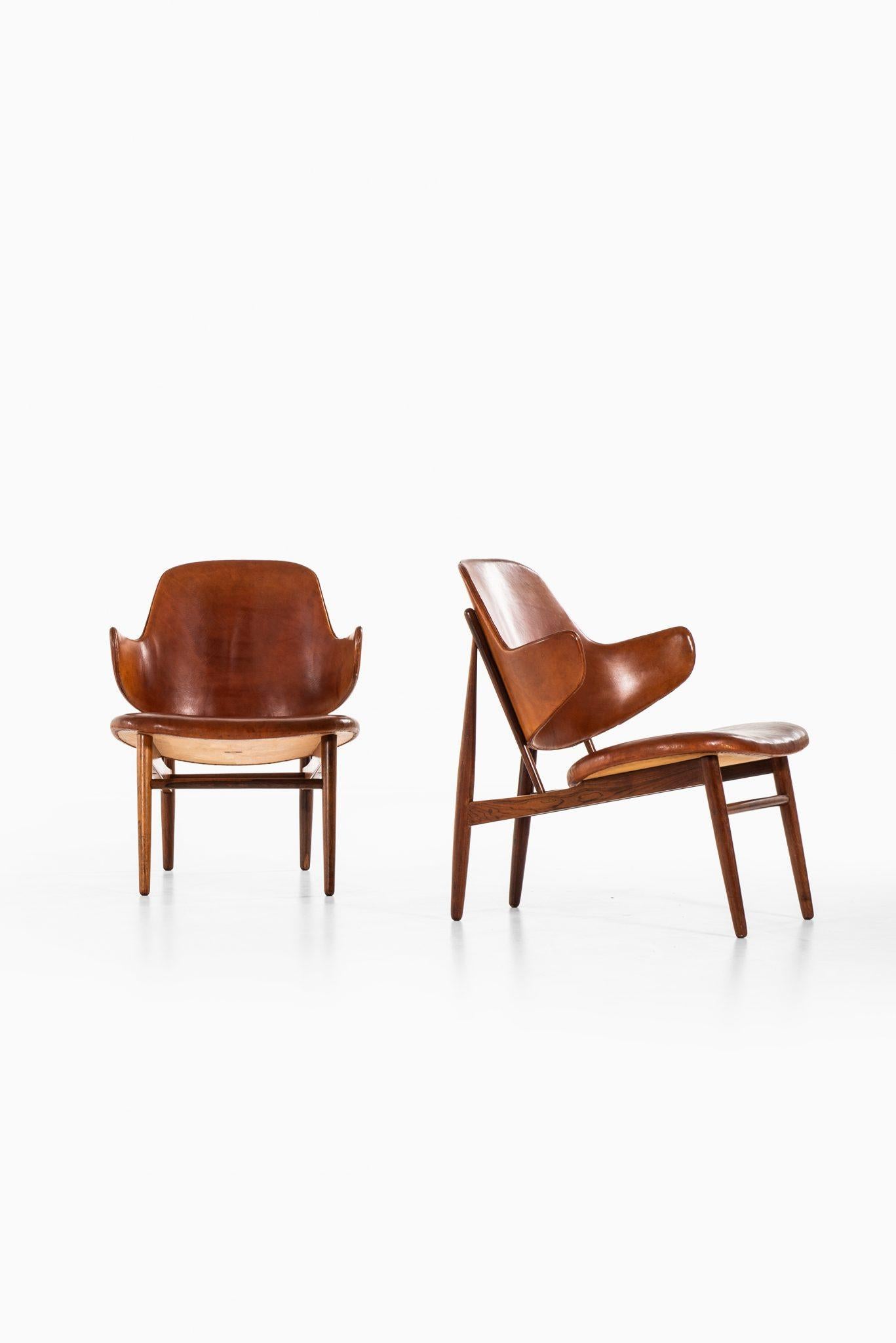 Very rare pair of easy chairs model DP 9 designed by Ib Kofod-Larsen. Produced by Christensen & Larsen in Denmark.