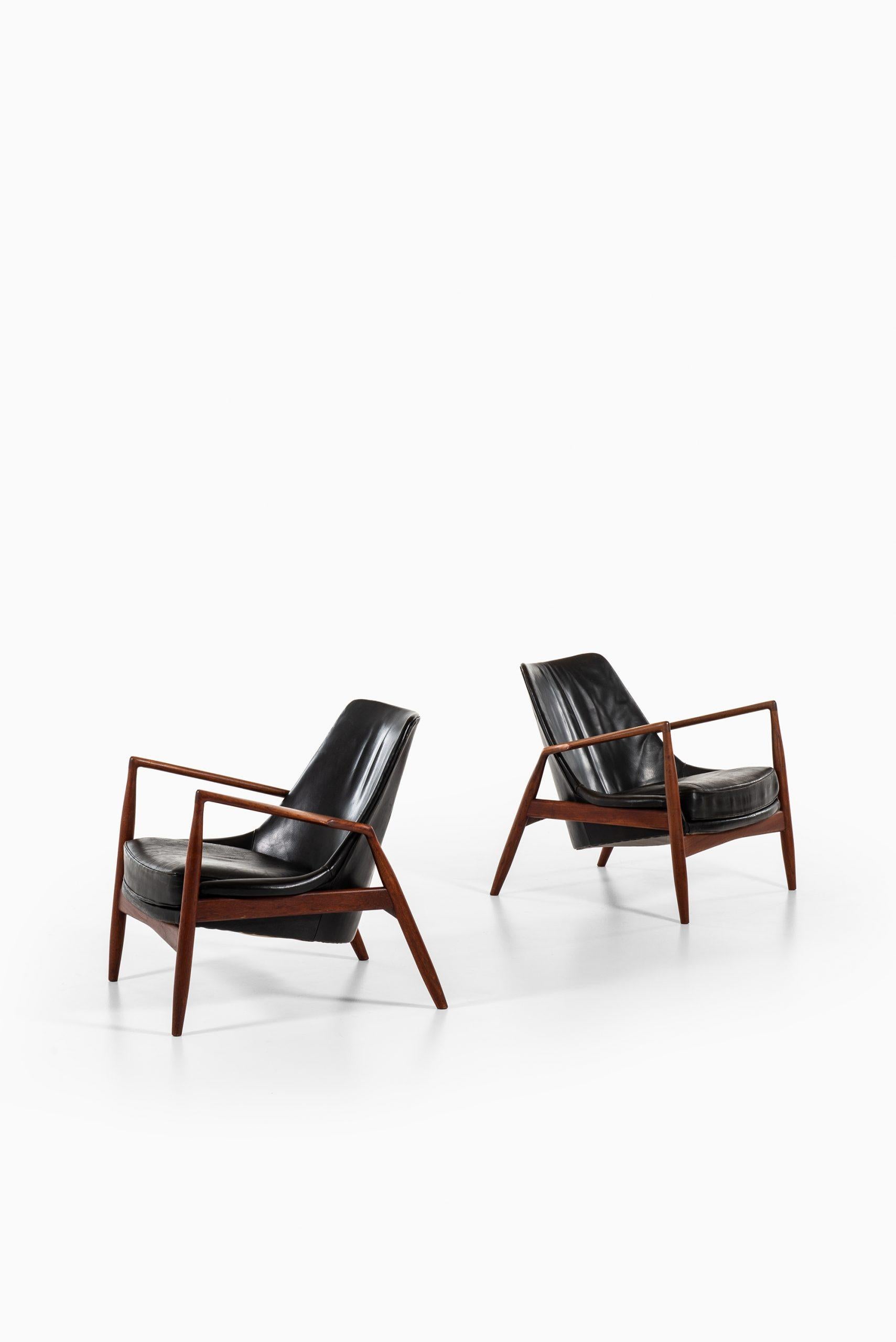 Rare pair of easy chairs model Sälen / Seal designed by Ib Kofod-Larsen. Produced by OPE in Sweden.