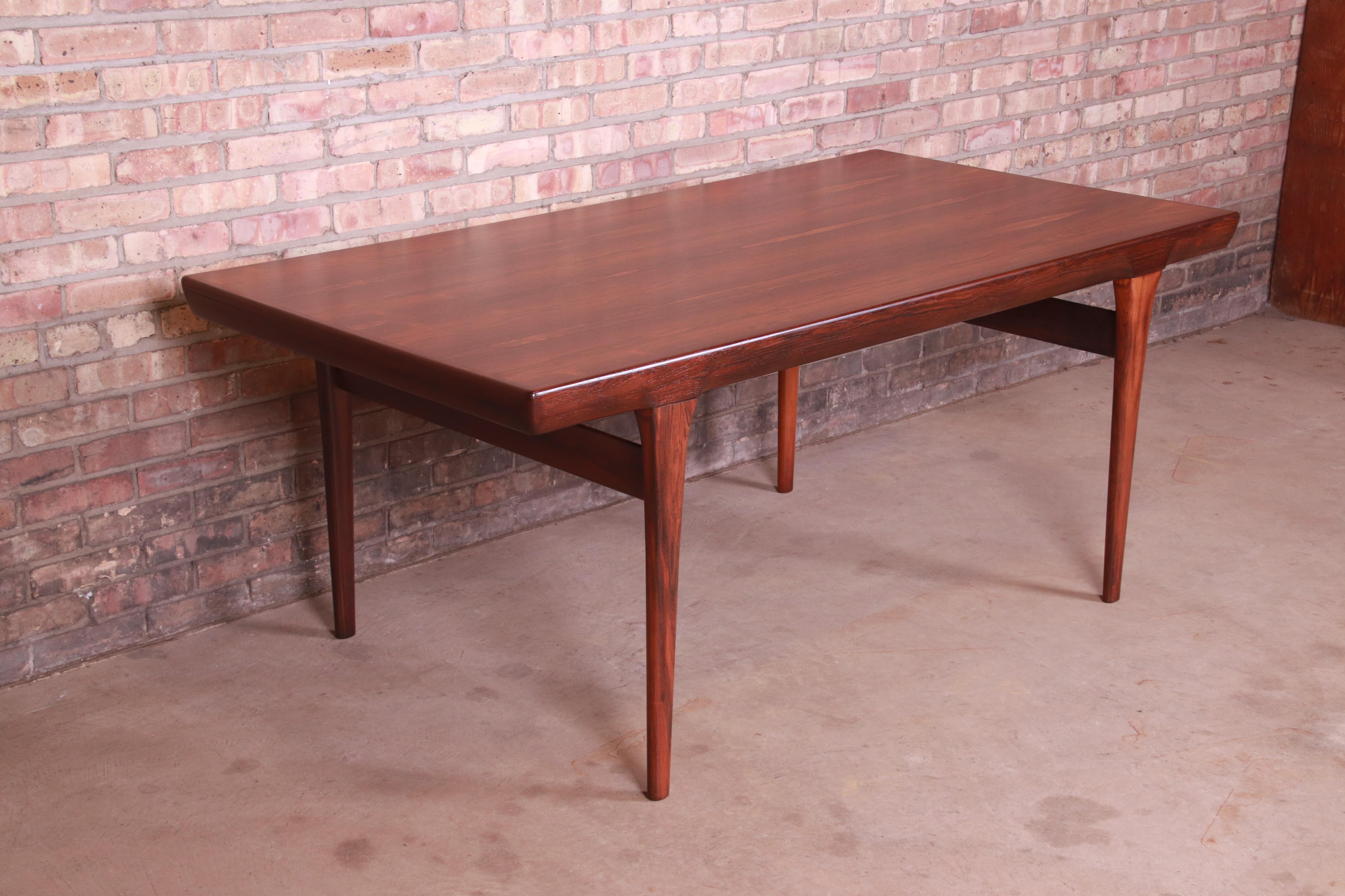 Ib Kofod-Larsen for Faarup Danish Modern Rosewood Dining Table, Newly Refinished In Good Condition In South Bend, IN