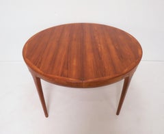Ib Kofod-Larsen for Faarup Danish Teak Round Dining Table with Two Leaves