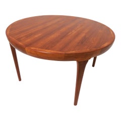 Ib Kofod-Larsen for Faarup Danish Teak Round Dining Table with Two Leaves