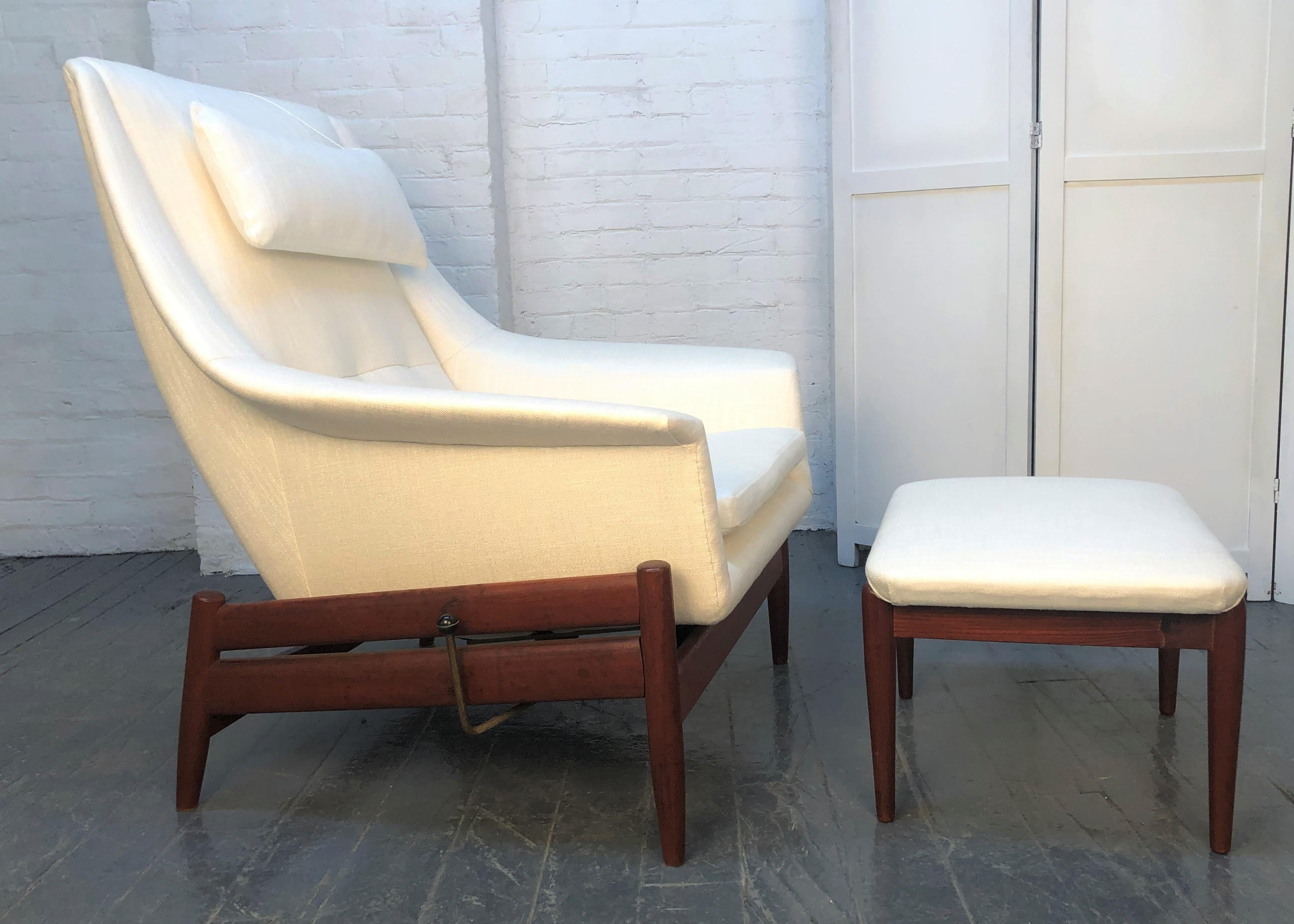 Ib Kofod-Larsen for Povl Dinesen Danish modern lounge chair and ottoman. The lounge chair rocks slightly and the ottoman is height adjustable. Mechanism on the side of the chair locks the chair in place. Has a removable headrest.
Measures (Chair)