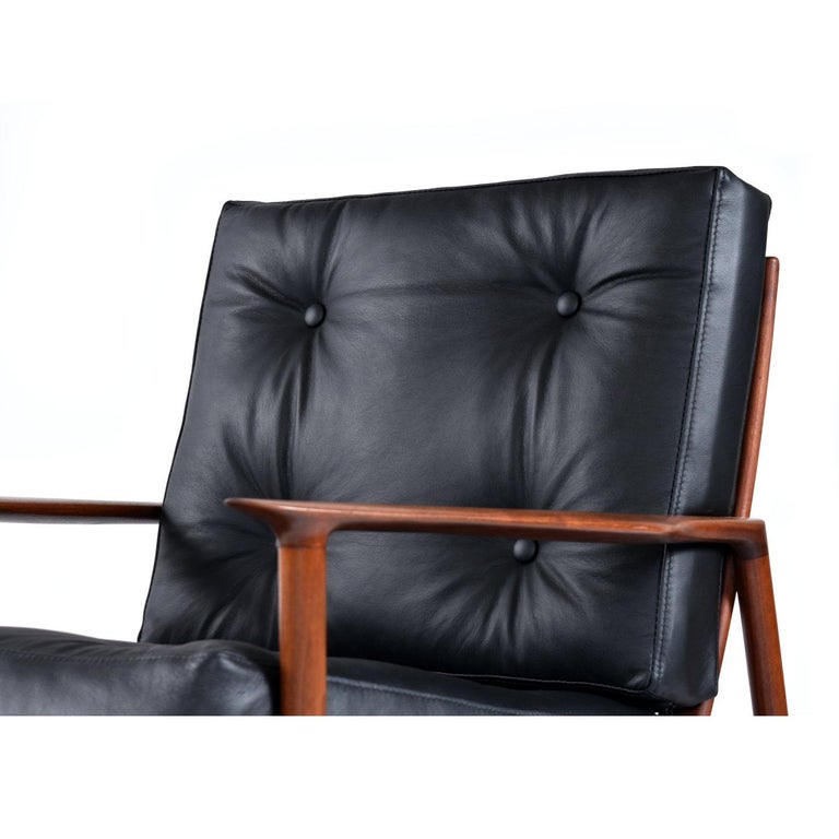 Ib Kofod Larsen for Selig Black Leather Armchair with Galloway’s Ottoman In Excellent Condition For Sale In Chattanooga, TN