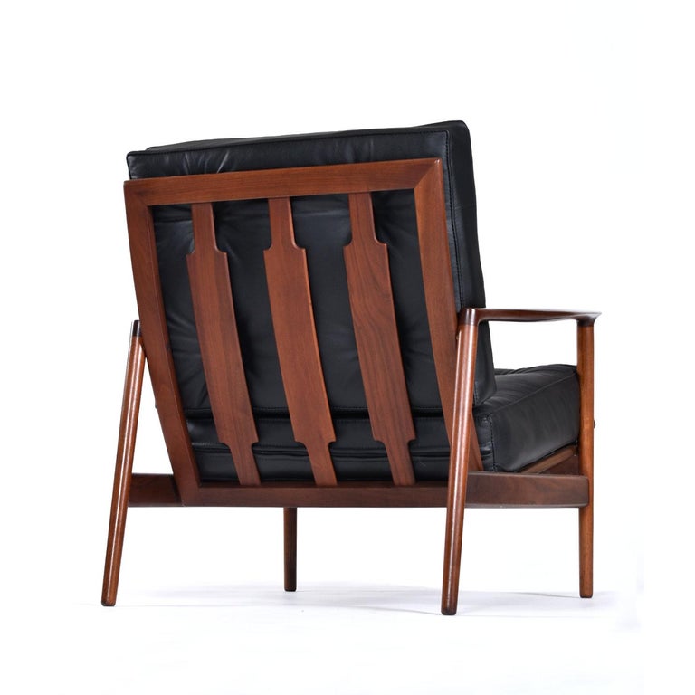 Mid-20th Century Ib Kofod Larsen for Selig Black Leather Armchair with Galloway’s Ottoman For Sale