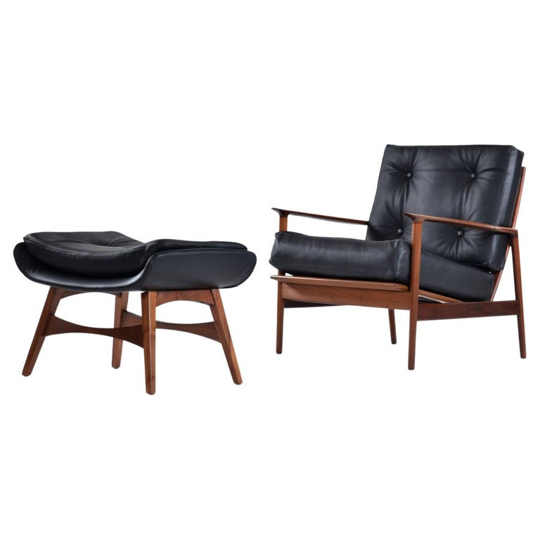 Ib Kofod Larsen for Selig Black Leather Armchair with Galloway’s Ottoman For Sale