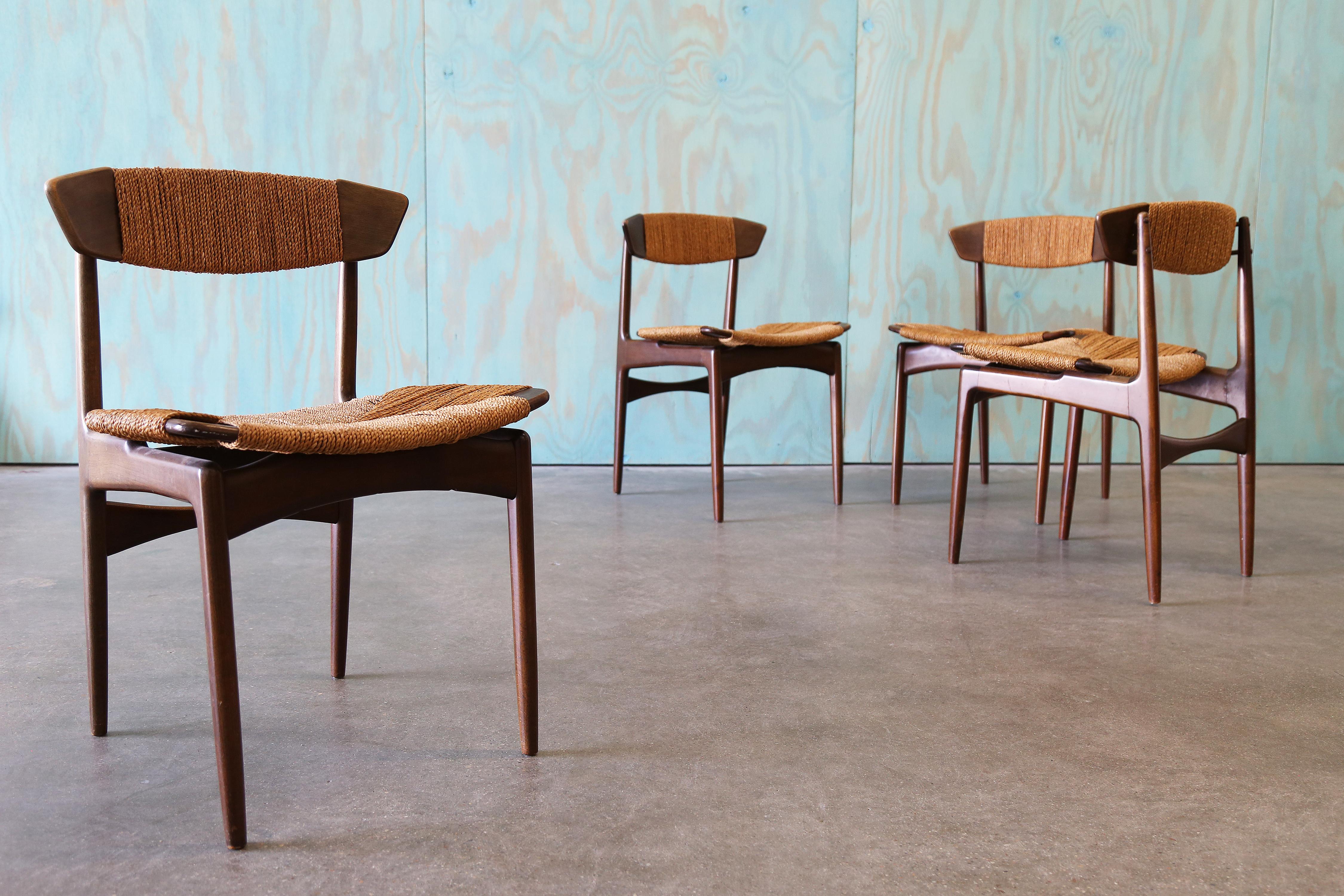 Beech and Seagrass dining chairs designed by Ib Kofod Larsen for Selig. Uncommon design.  Danish design cues reminiscent of Finn Juhl like the floating seat and back.  A great use of natural materials, the seagrass adds great warmth and texture.  A