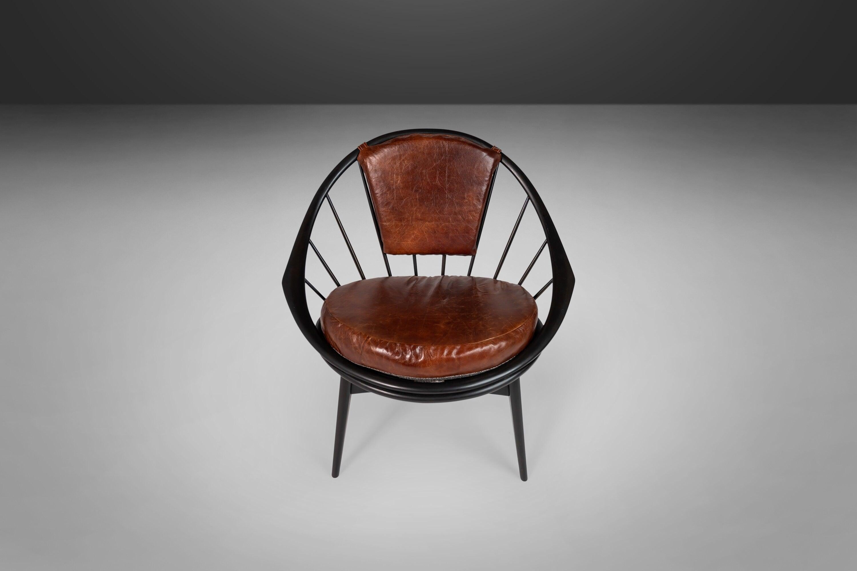 Danish Ib Kofod-Larsen for Selig Ebonized Hoop Chair, Peacock Chair w/ Patinaed Leather For Sale