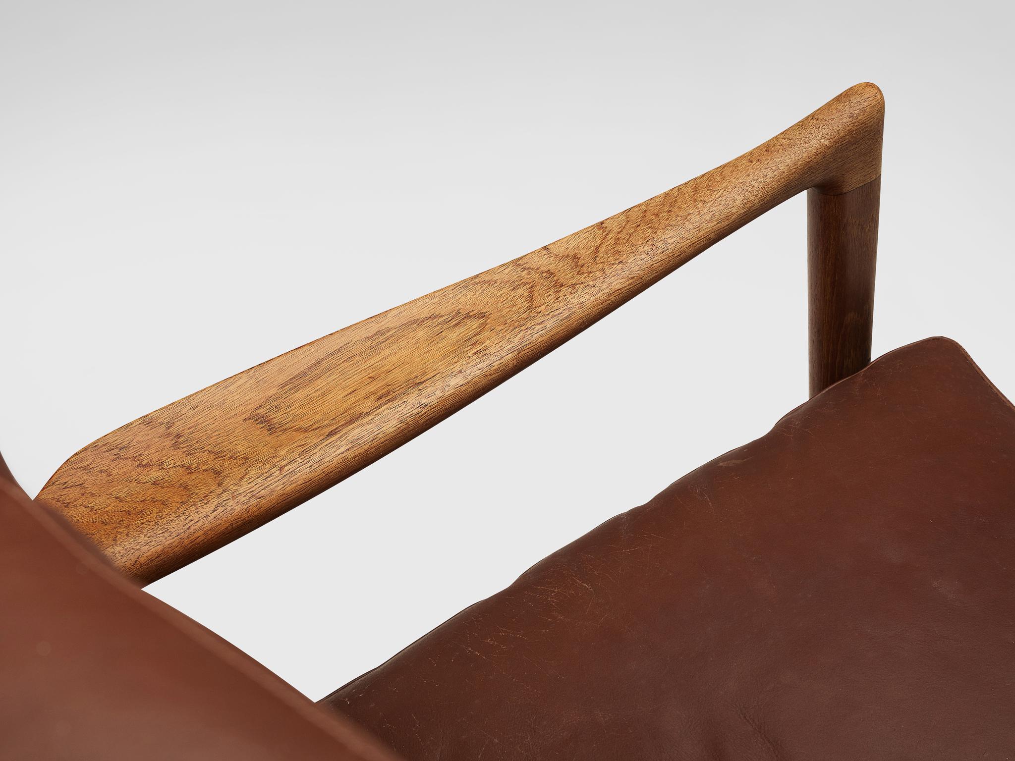 Ib Kofod-Larsen High Back Armchair in Teak and Brown Leather In Good Condition In Waalwijk, NL