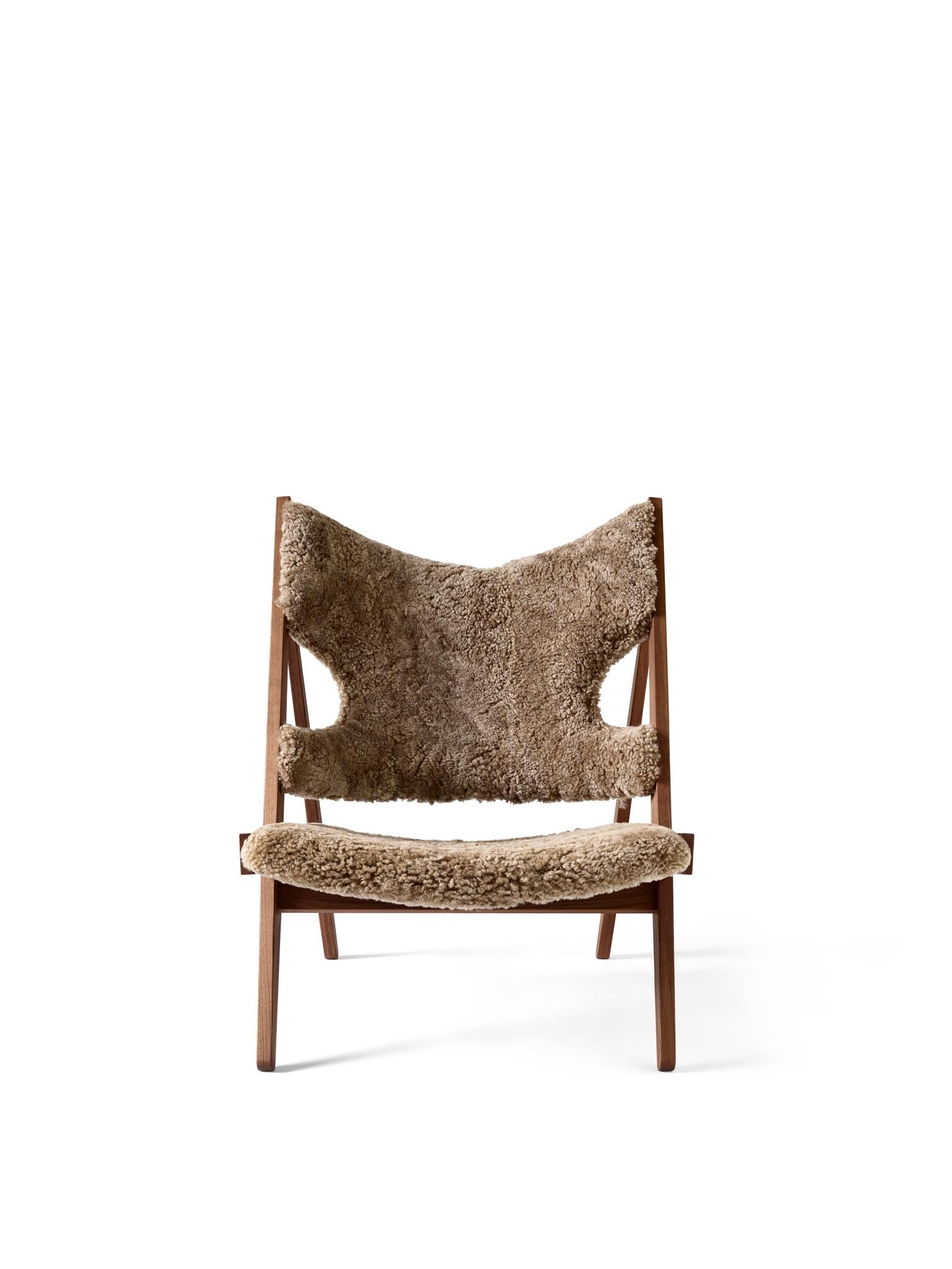 First launched as a limited edition in 1951, Ib Kofod-Larsen’s Knitting Lounge Chair is reimagined with a natural oak, dark stained oak or walnut frame. The distinctive piece is meticulously handcrafted by skilled artisans, merging traditional