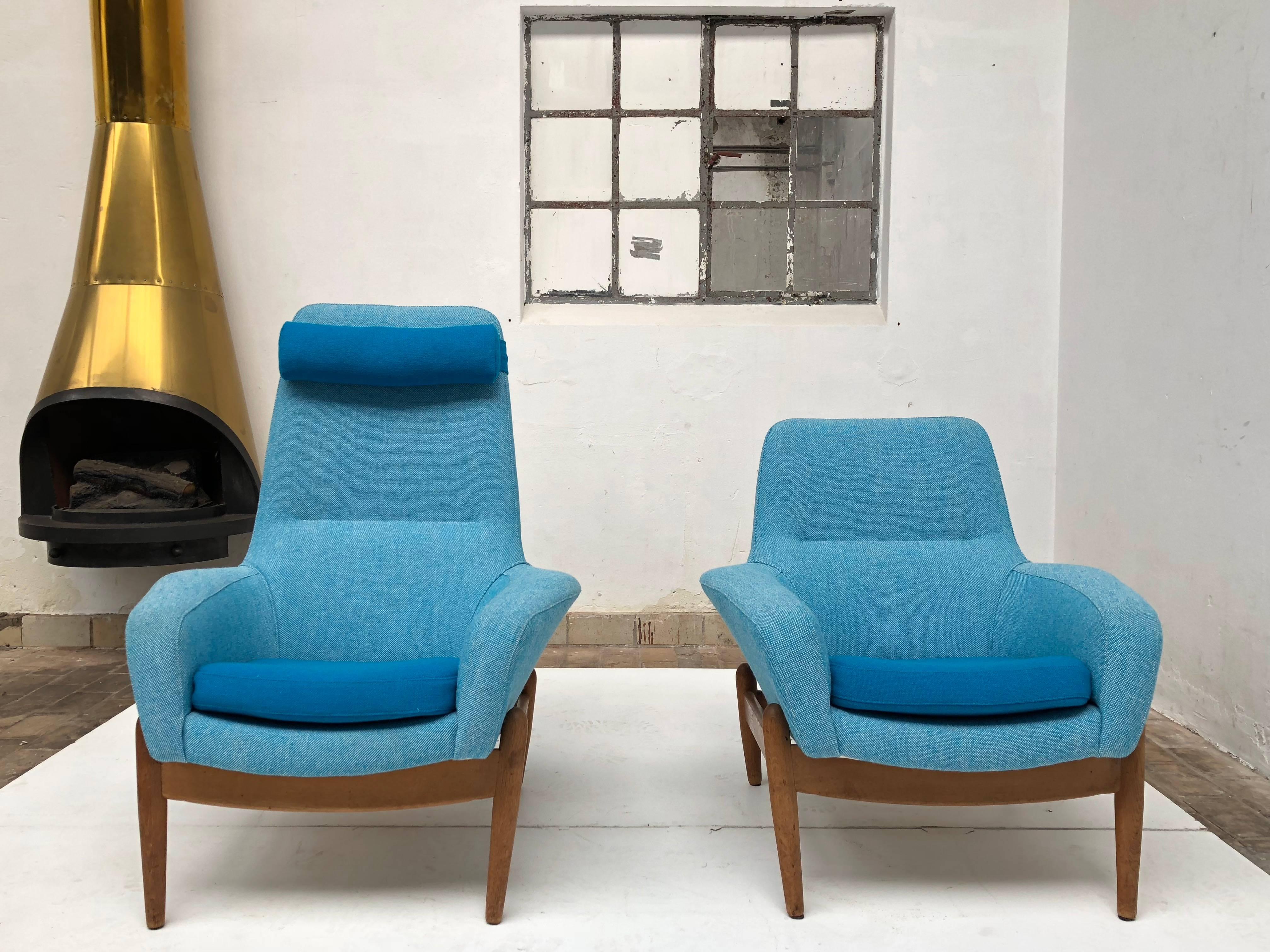 Pair of Danish design lounge chairs by designers Arnold Madsen & Henri Schubell that were distributed in the Netherlands by Bovenkamp in the 1950's and 1960's

Beautiful organic carved solid oak wood frames and newly upholstered in a Turquoise /