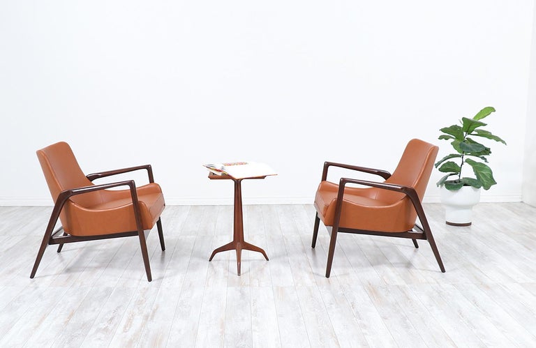 Ib Kofod-Larsen leather sculpted lounge chairs for Selig.