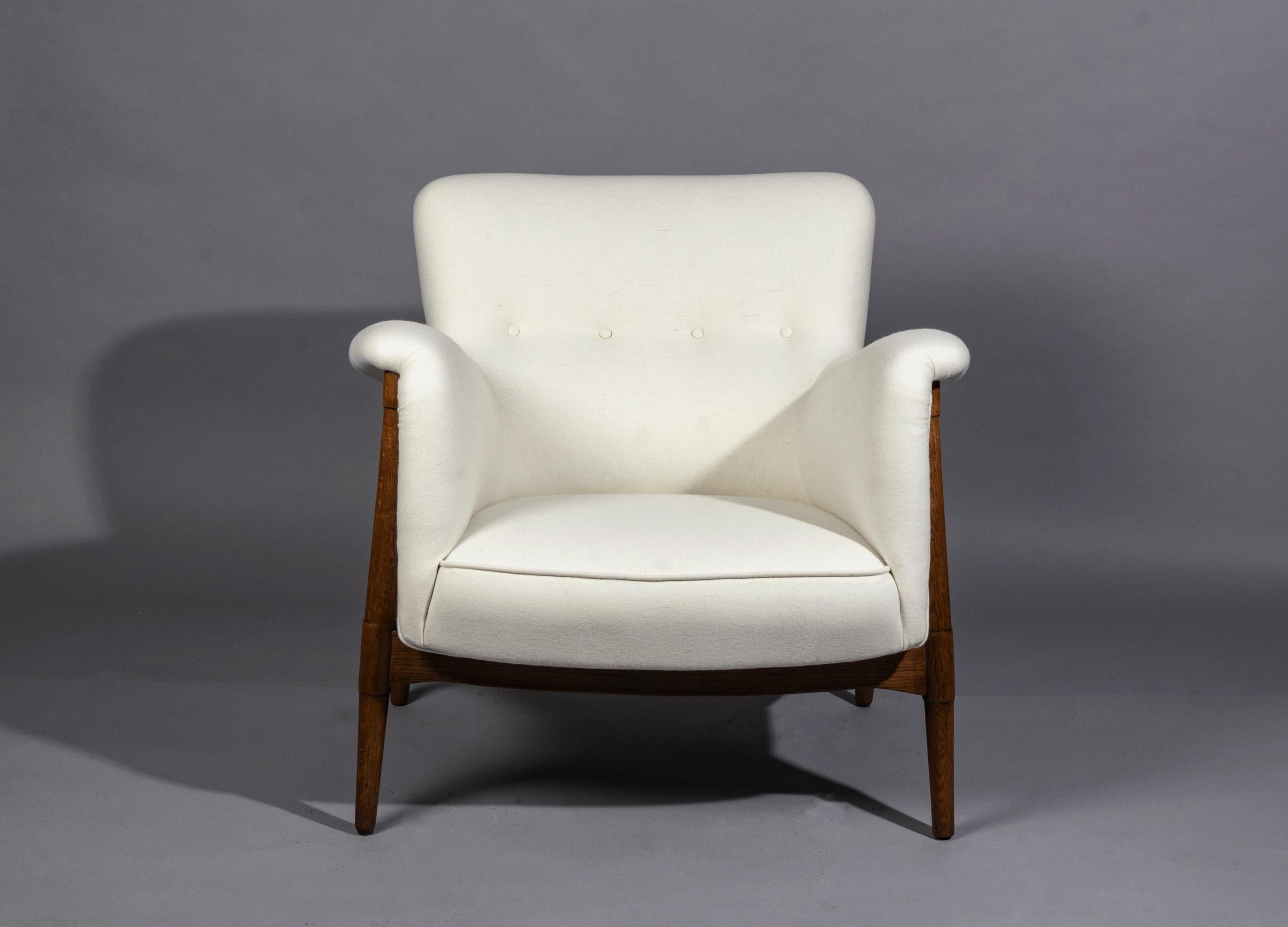 Ib Kofod-Larsen lounge chair, Denmark, 1950s. Newly waxed teak frame and upholstered in high quality Italian wool.