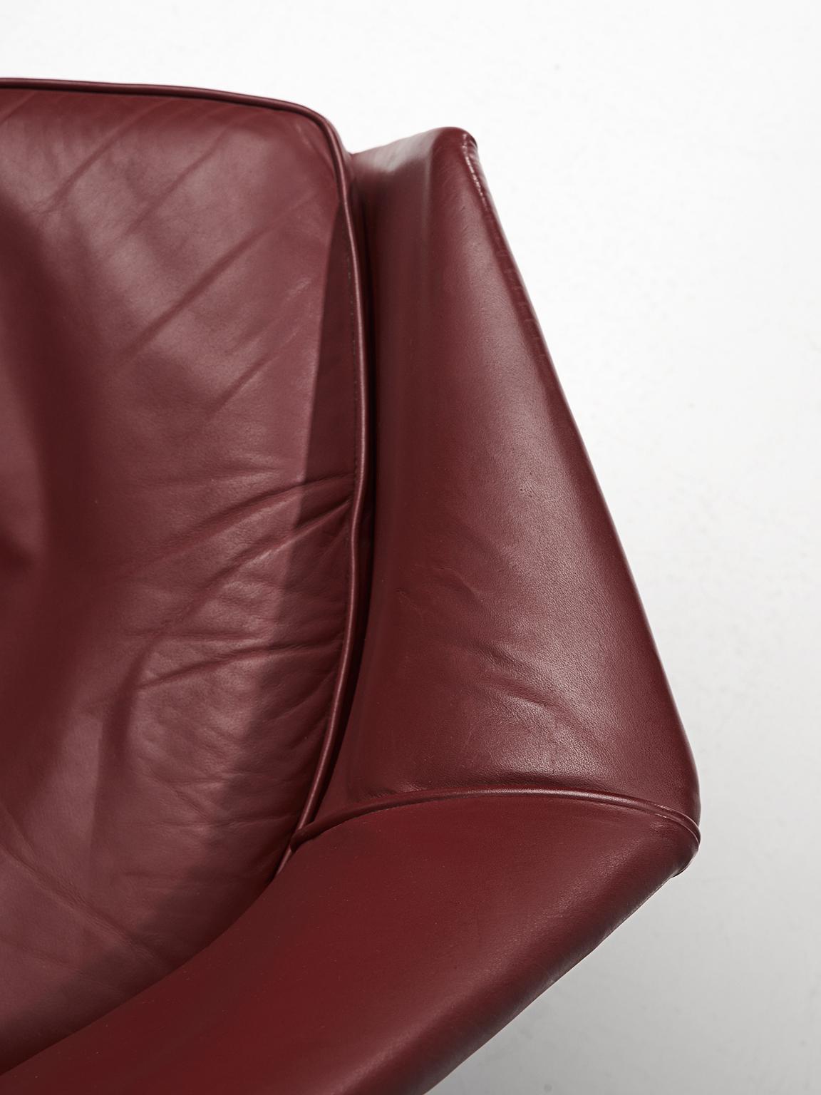 Ib Kofod-Larsen Lounge Chairs in Rosewood and Burgundy Leather 1