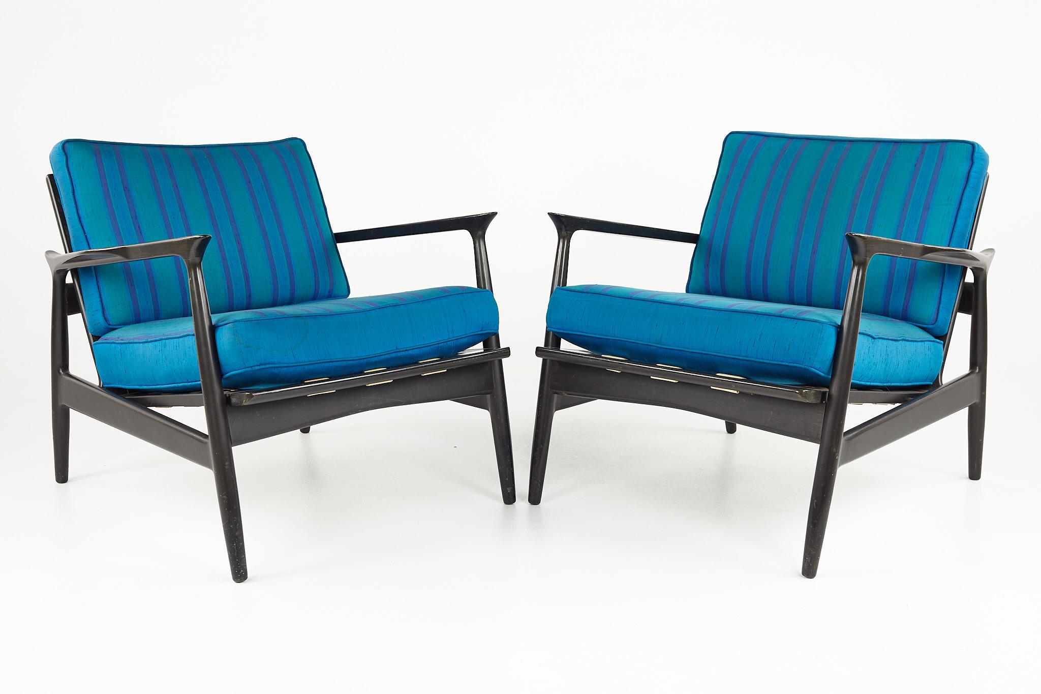 IB Kofod Larsen mid century ebonized and Grasscloth Danish lounge chairs - pair

Each chair measures: 30 wide x 32 deep x 28 inches high, with a seat height of 16 and arm height of 23 inches

All pieces of furniture can be had in what we call