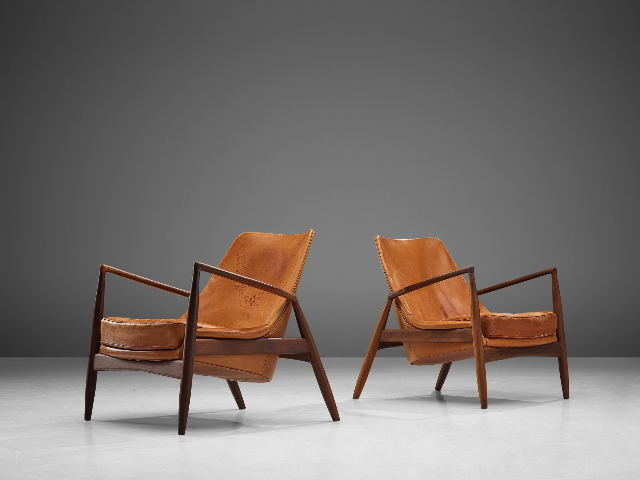 Mid-20th Century Ib Kofod-Larsen Pair of 'Seal' Chairs in Original Leather