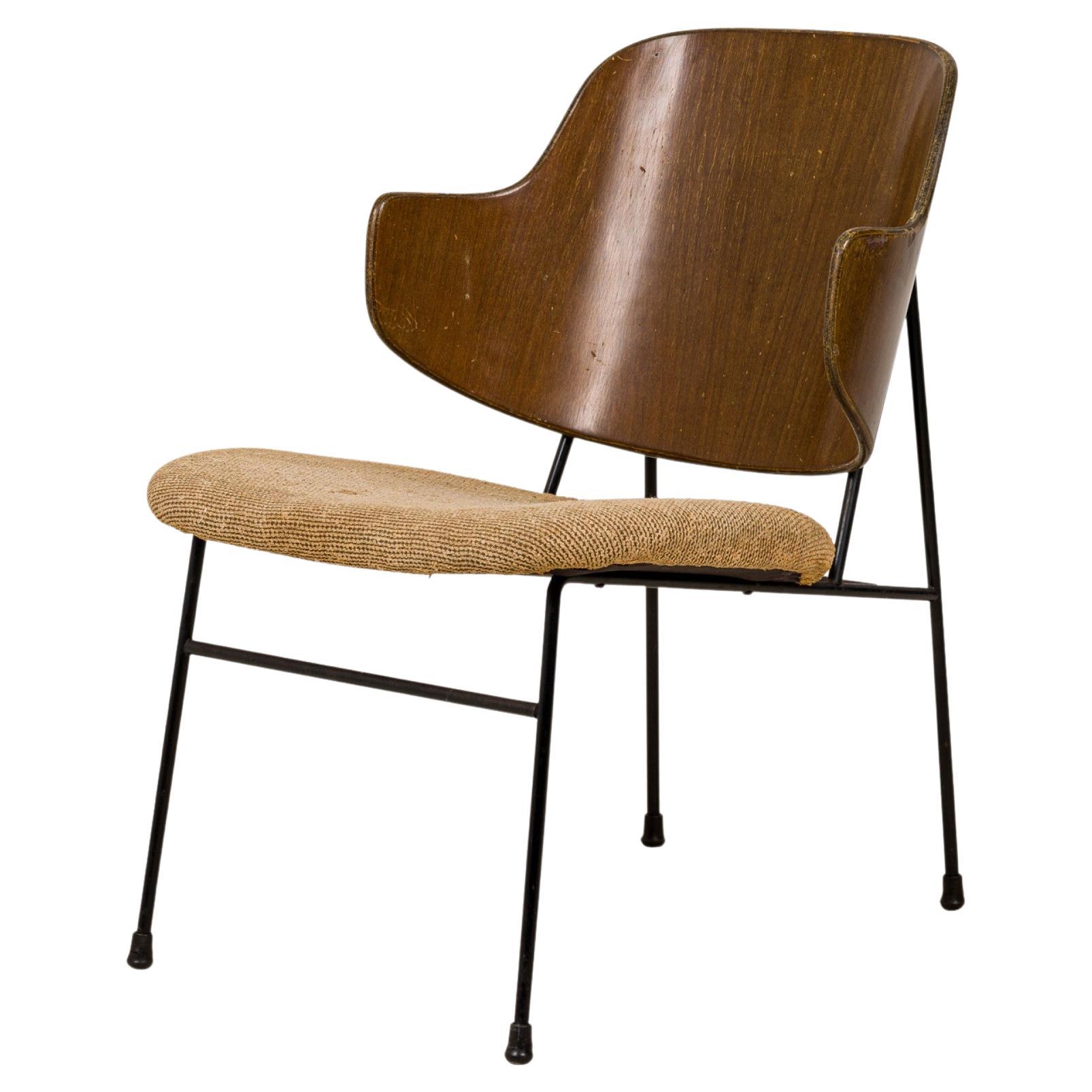 I.B. Kofod Larsen 'Penguin' Wood, Iron and Beige Fabric Upholstered Lounge Chair For Sale