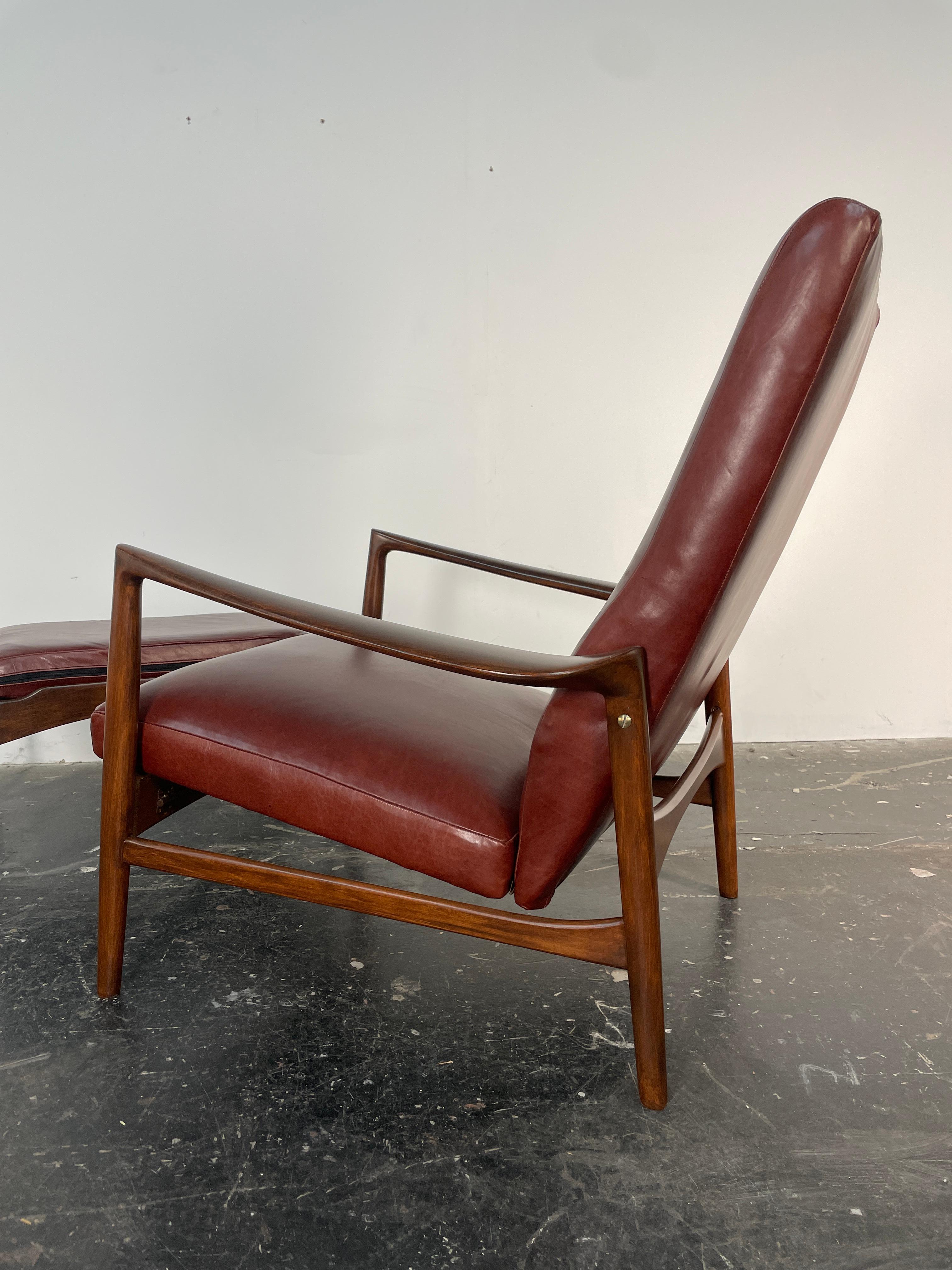 Stained Ib Kofod-Larsen Recliner and Ottoman for Selig in Oxblood Italian Leather