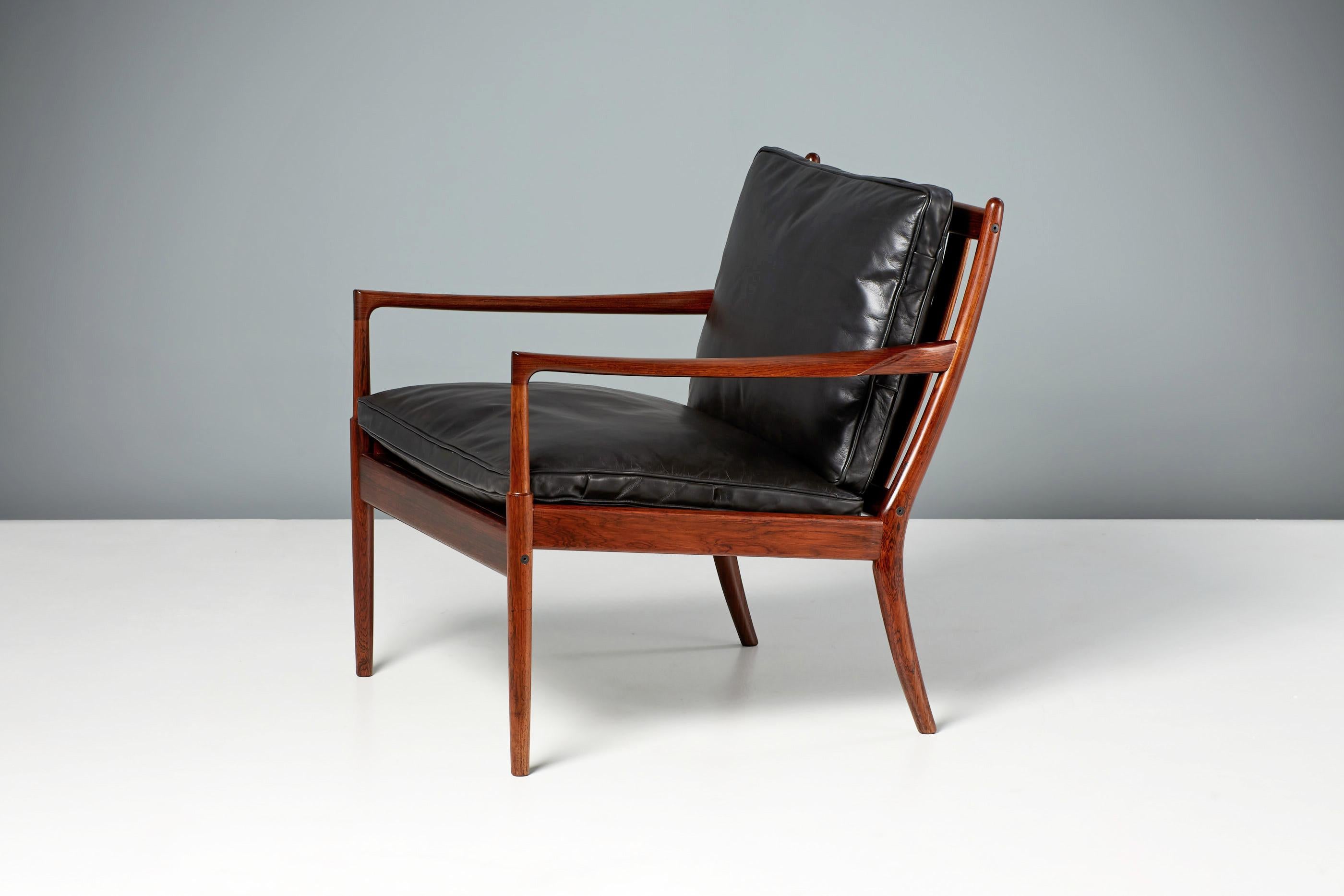 Ib Kofod-Larsen Samso Lounge Chairs, circa 1960s

Rare lounge chair produced for Olof Perssons Fatoljindustri (OPE) in Jonkoping, Sweden by Danish master designer Ib Kofod-Larsen. Sorensen Icon, Black Leather cushion covers and highly figured
