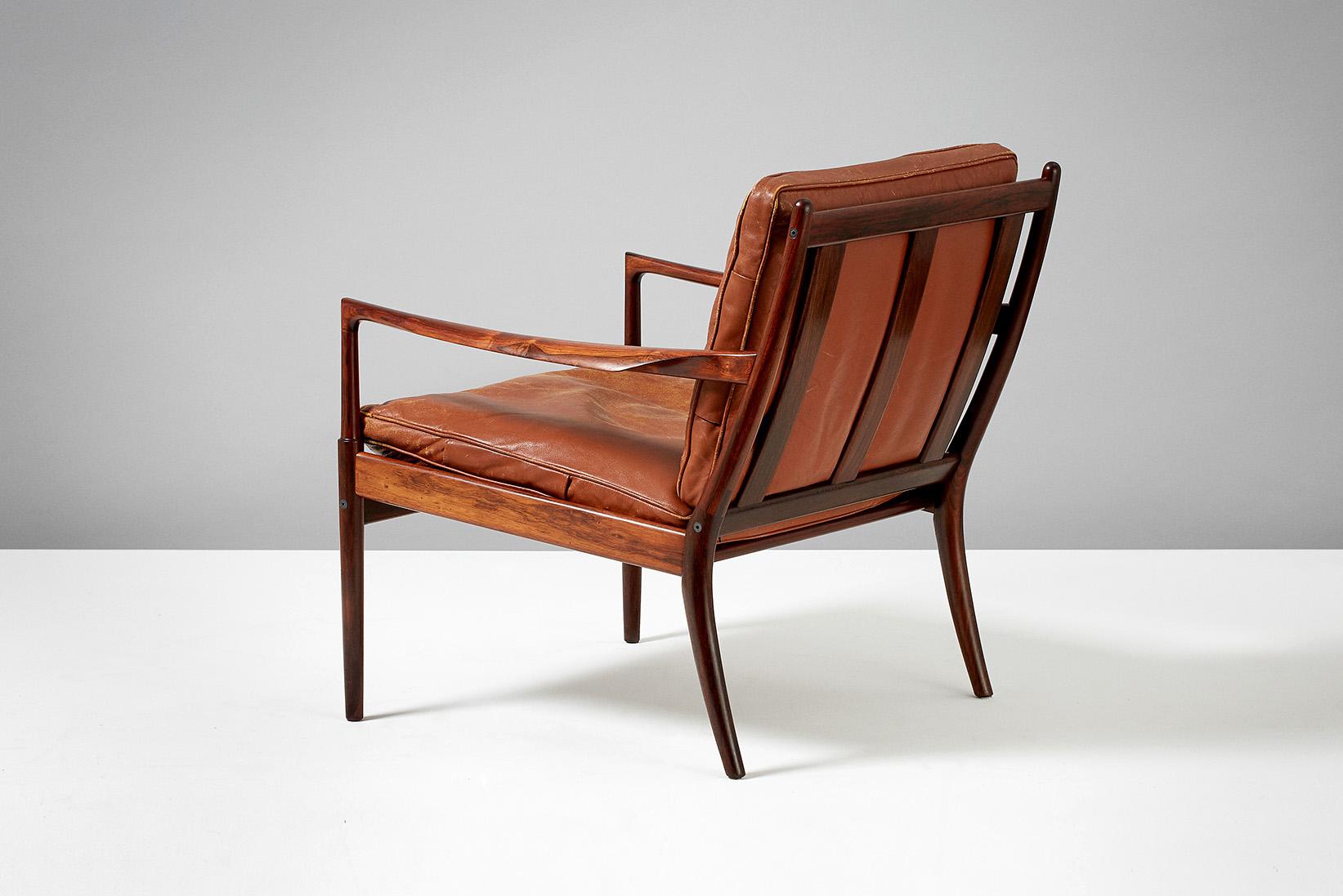 Ib Kofod-Larsen

Samso lounge chair, circa 1958.

Rarely seen lounge chair produced by Olof Perssons Fatoljindustri (OPE), Jonkoping, Sweden. Highly figured exotic rosewood frame with patinated original tan leather, down-filled cushions.
 