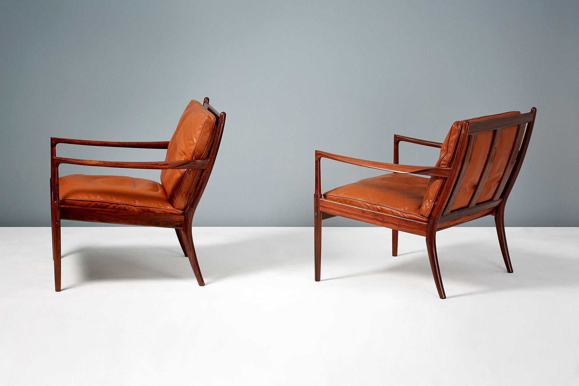 Ib Kofod-Larsen

Samso lounge chairs, circa 1958.

Rarely seen lounge chairs produced by Olof Perssons Fatoljindustri (OPE), Jonkoping, Sweden. These examples are made from highly figured exotic rosewood and come with their patinated original