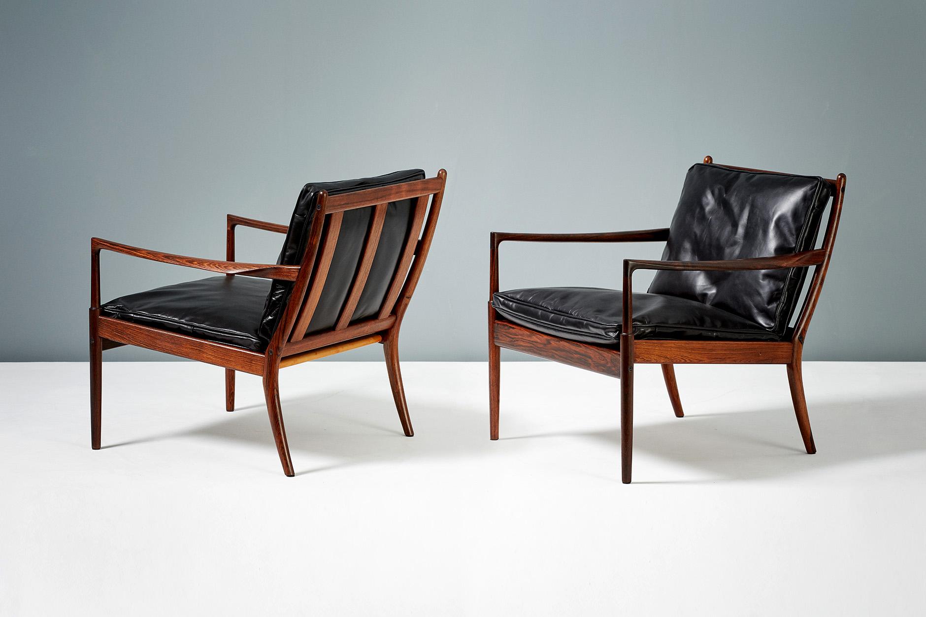 Ib Kofod-Larsen

Samso lounge chairs, circa 1958.

Rarely seen lounge chairs produced by Olof Perssons Fatoljindustri (OPE), Jonkoping, Sweden. These examples are made from highly figured exotic rosewood and come with black leather,