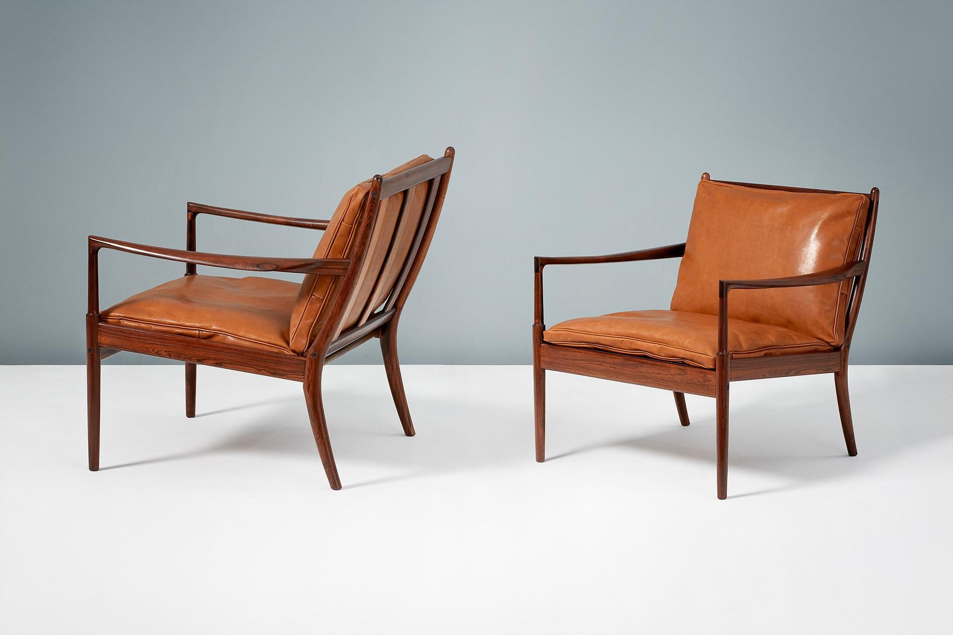 Ib Kofod-Larsen

Samso-Sessel, um 1958.

Selten zu sehende Loungesessel, hergestellt von Olof Perssons Fatoljindustri (OPE), Jonkoping, Schweden. Diese Exemplare sind aus stark gemasertem exotischem Palisanderholz gefertigt und werden mit ihren