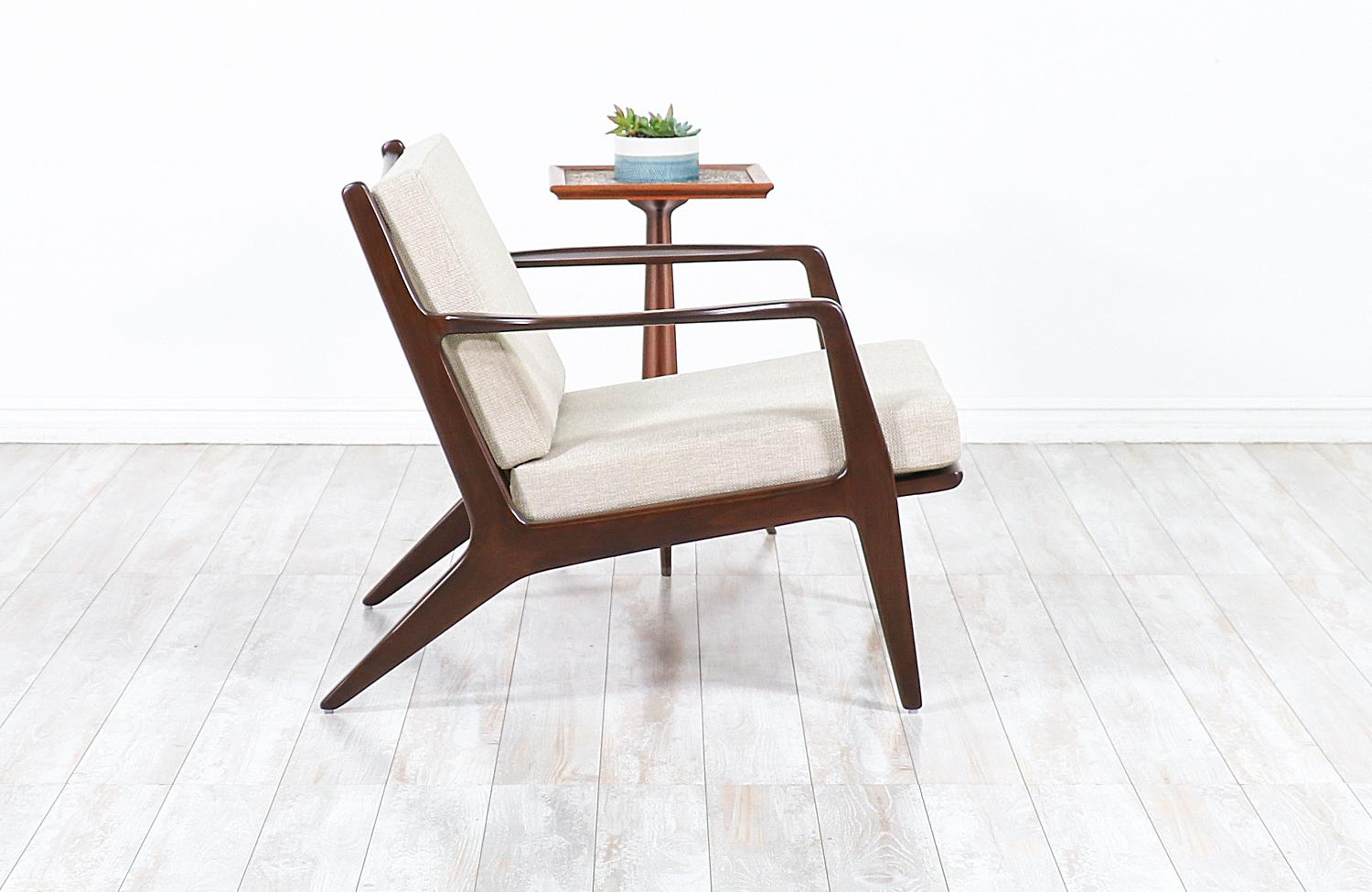 Mid-Century Modern Ib Kofod-Larsen Sculpted Walnut Lounge Chair for Selig