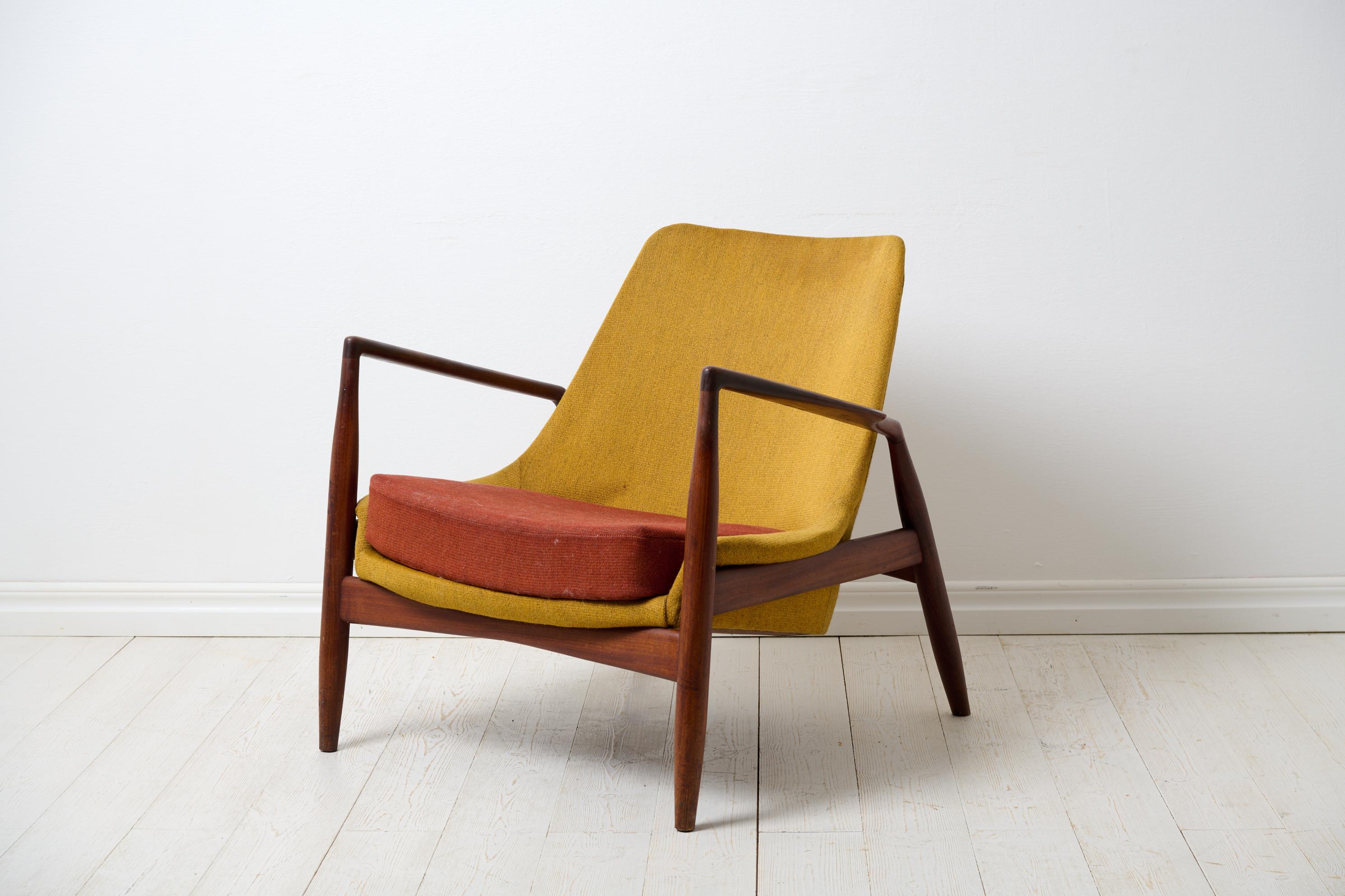 Scandinavian modern “Seal” armchair designed by Ib Kofod Larsen, Denmark. Made by OPE, Olof Persson Möbler, Jönköping Sweden. “Sälen”, as is the original name of the chair, is from the 1950s to 1960s, designed in 1956 and marked underneath the seat