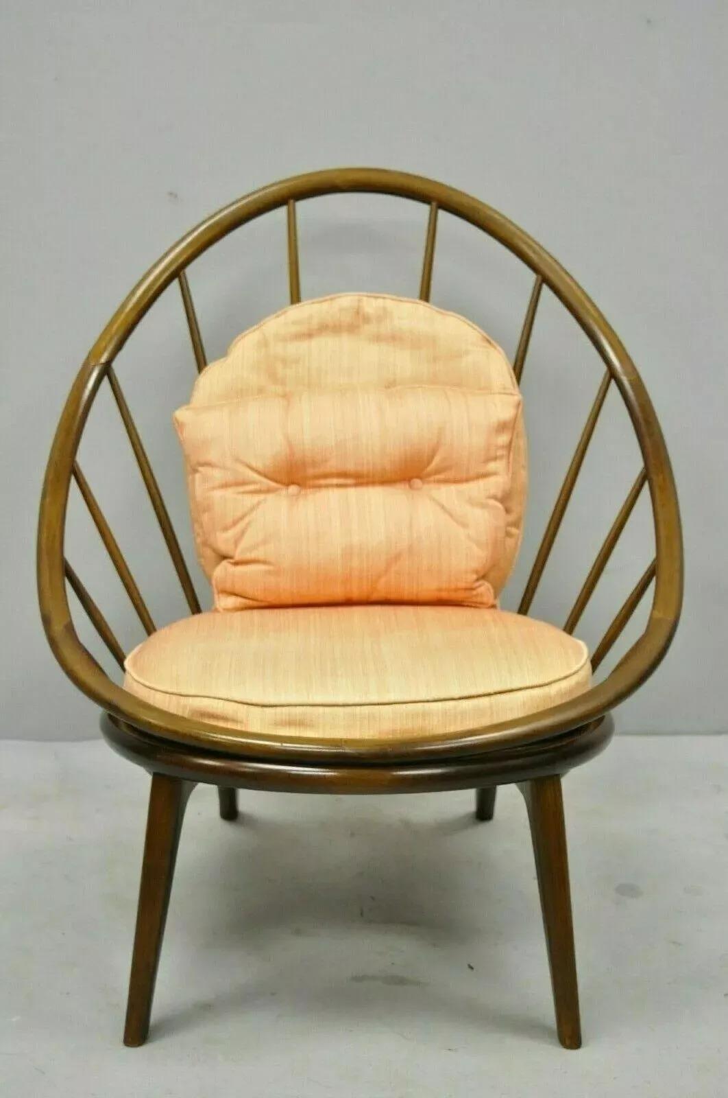 IB Kofod Larsen Selig Style Danish Modern Walnut Peacock Hoop Spindle Chair. Item features solid wood construction, clean modernist lines, upholstered seat, great style and form. Circa Mid 20th Century. Measurements: 30.5
