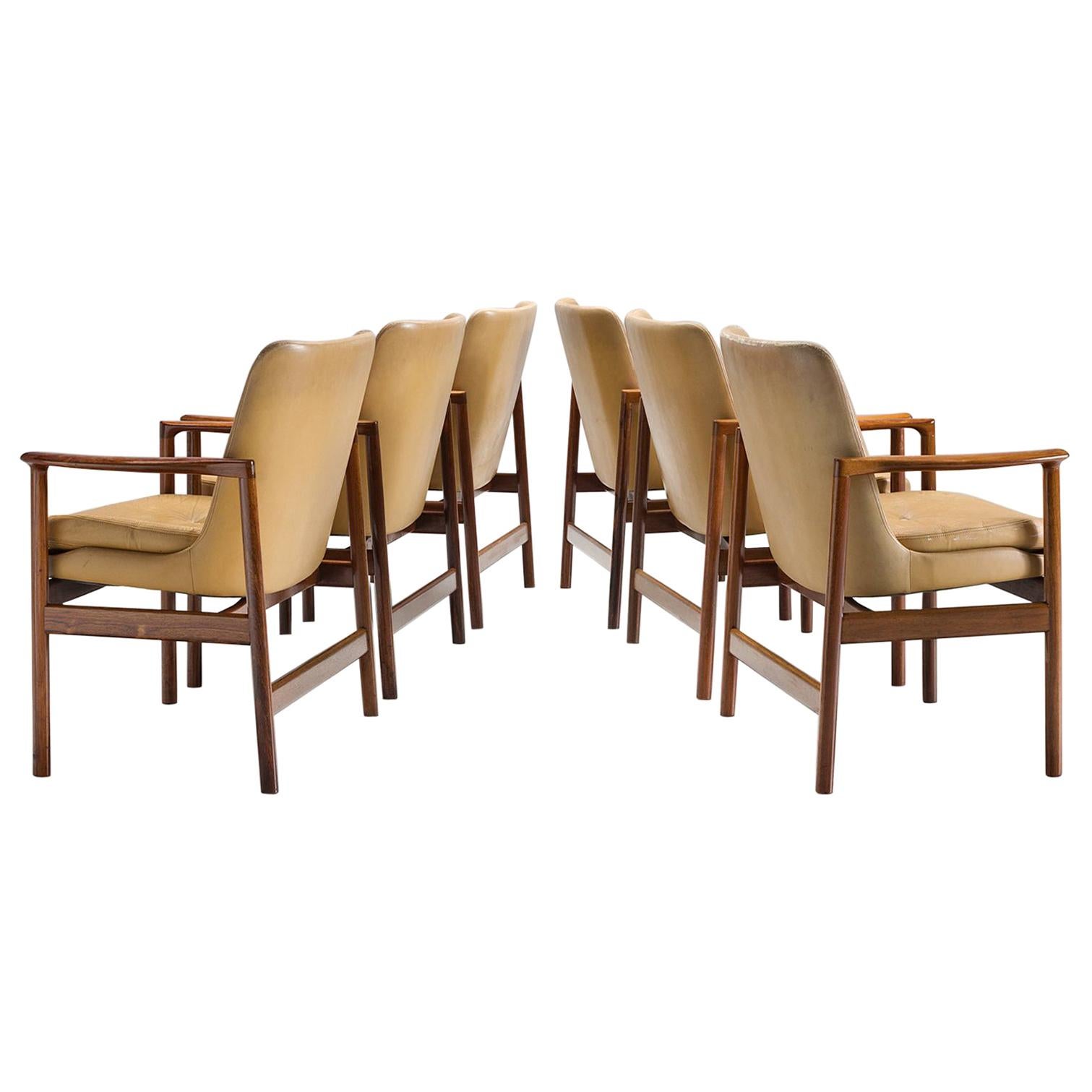 Ib Kofod-Larsen Set of Six Armchairs in Rosewood and Natural Leather