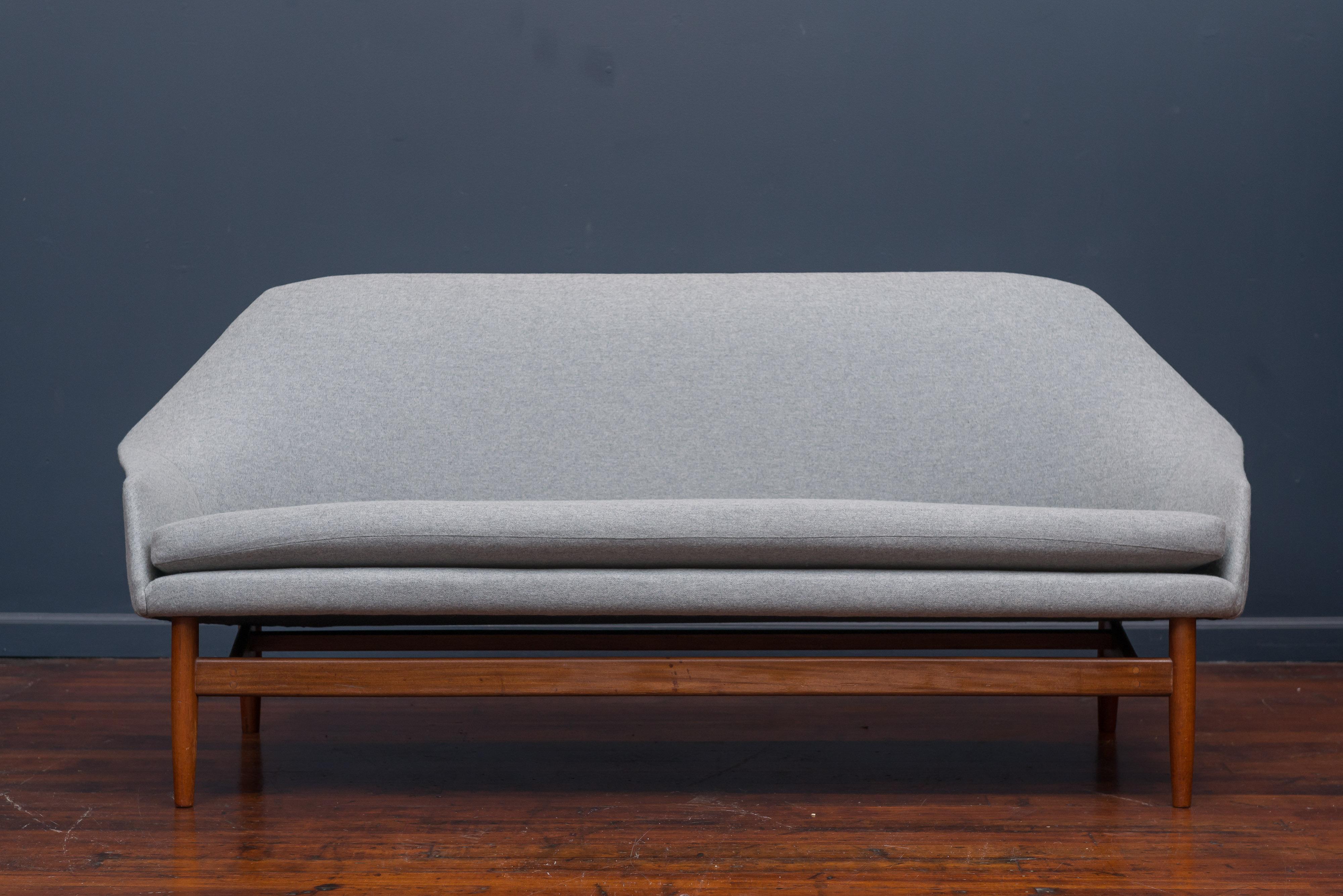 Ib Kofod Larsen design settee or small sofa for Carlo Garhn, Denmark, 1957. Newly upholstered and refinished.