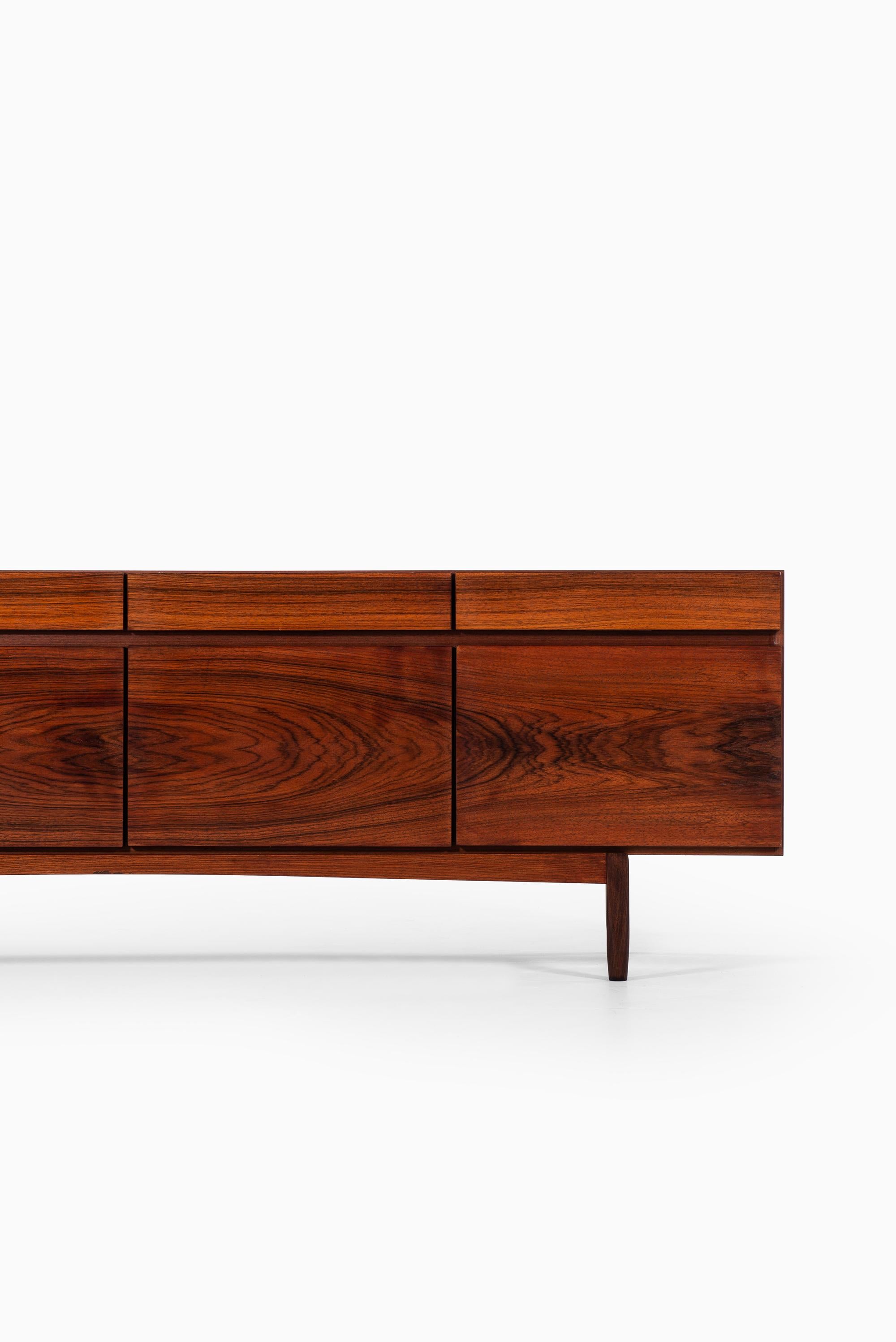 Rare freestanding sideboard model FA-66 designed by Ib Kofod-Larsen. Produced by Faarup møbelfabrik in Denmark.