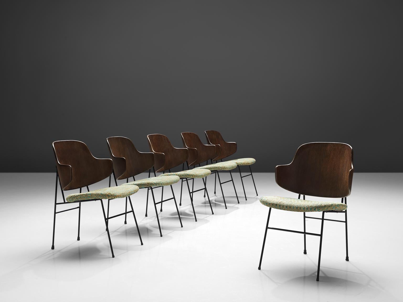 Ib Kofod-Larsen, six 'Penguin' chairs, walnut, steel, metal, Denmark, design 1953, production 1960s.

This is a set of six 'Penguin' chairs by Ib Kofod-Larsen, but they come from a set of 36 that is available in total. The chair was first taken