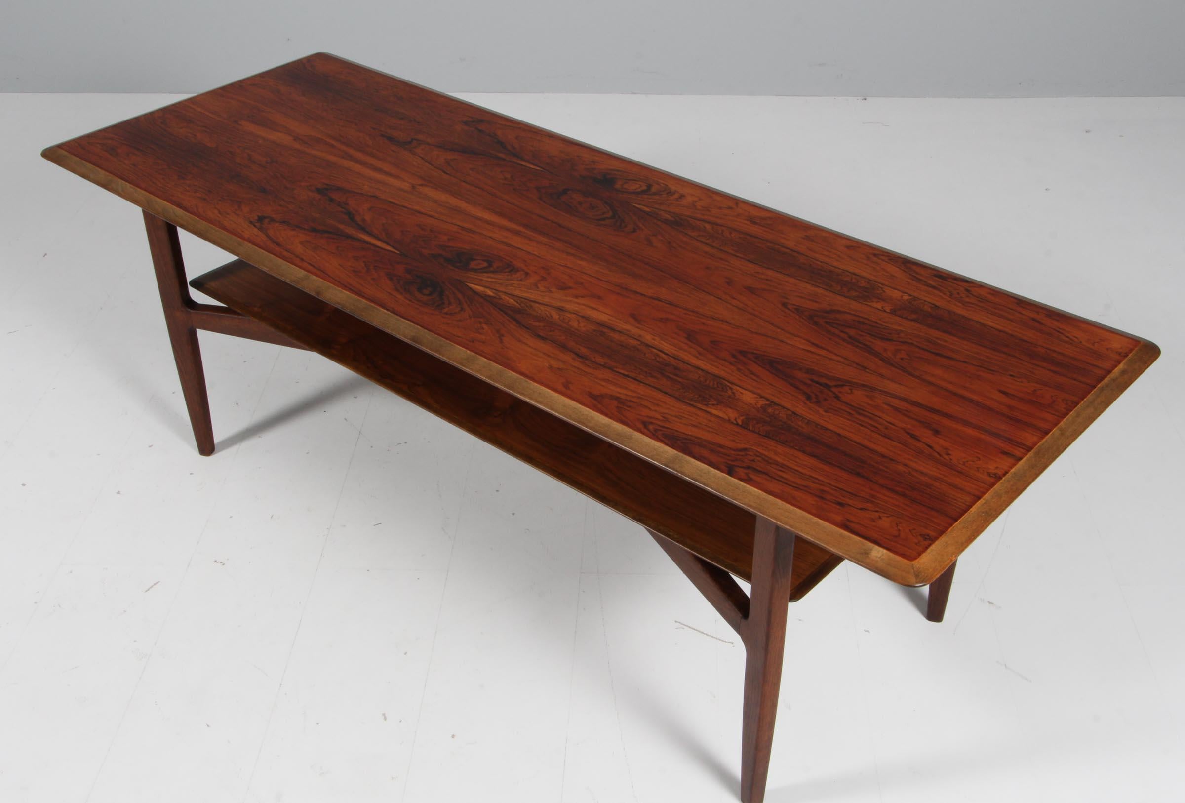 Ib Kofod-Larsen sofa table in oak and rosewood

Made by Christensen & Larsen.