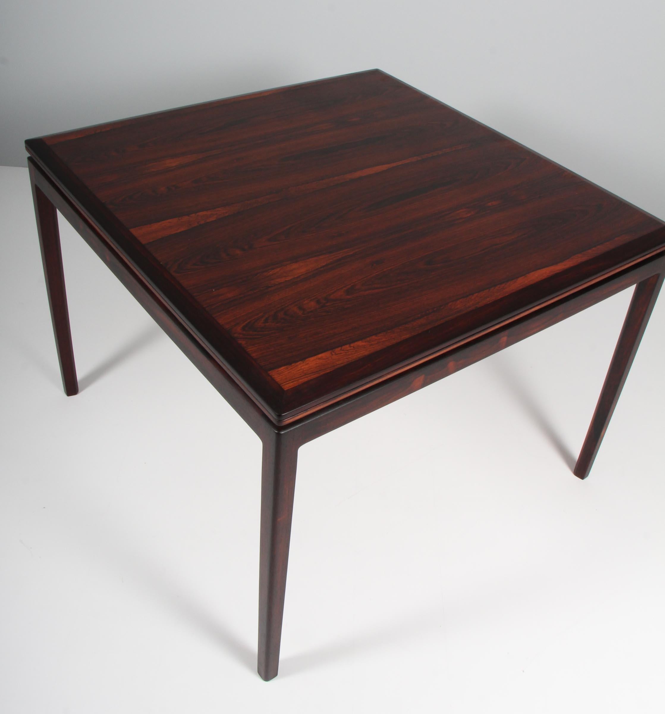 Ib Kofod-Larsen dining table in partly solid rosewood. Flip flop extension leaf.

Made by Christensen & Larsen.